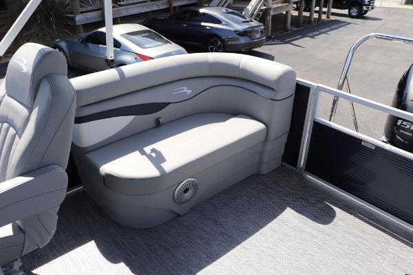 2024 Bennington 21 SSR boat interior with gray seating and carpeted floor.
