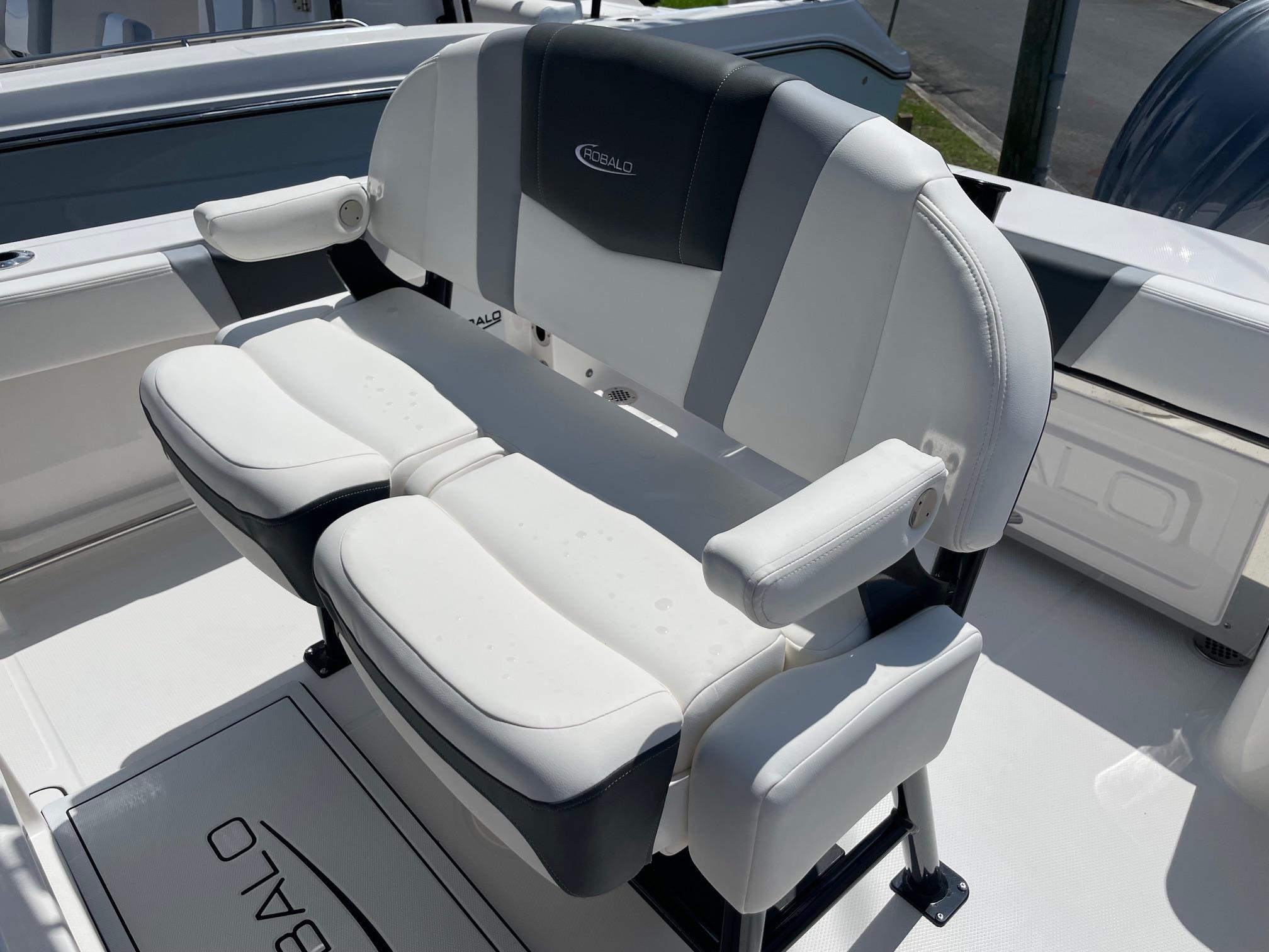 2025 Robalo R230 Center Console boat seat with white and gray upholstery.