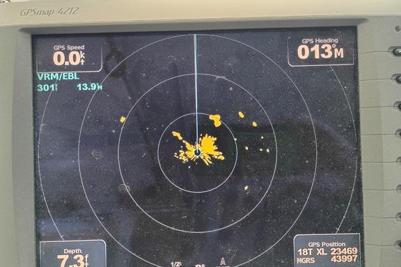 Radar display on Thompson Passenger and Dive Trawler, 1980 model, showing GPS speed and heading.