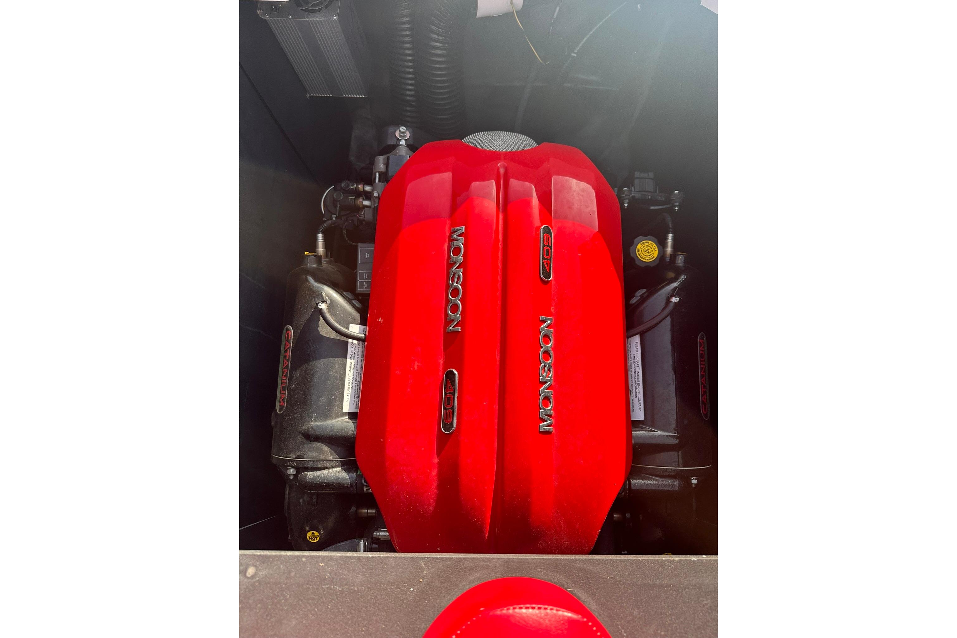 Red Monsoon 409 engine in a 2017 Axis T23 boat, showcasing powerful performance.