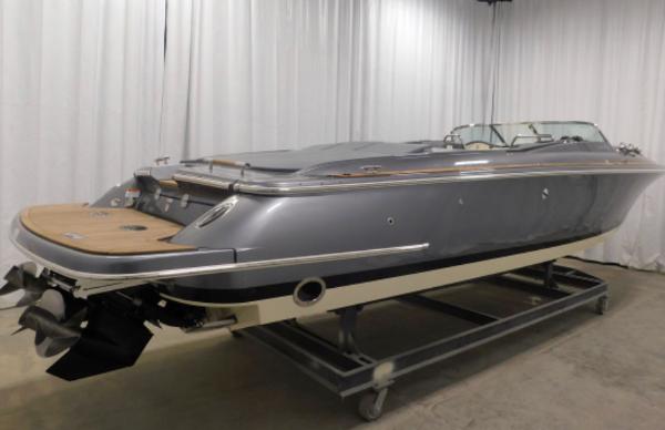 2021 Chris-Craft Corsair 34 boat in a showroom.