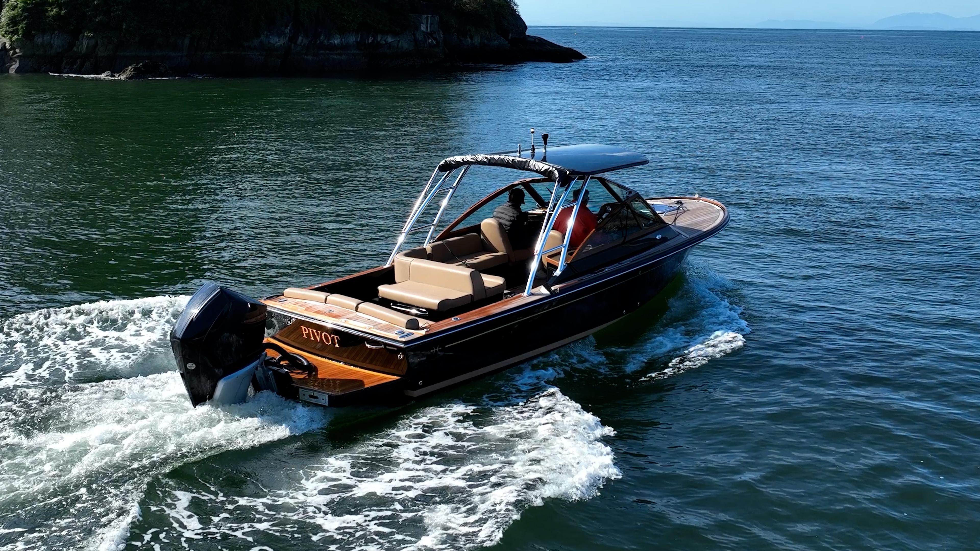 2021 Hunt Yachts Harrier 26 cruising on open water, showcasing sleek design and powerful engine.