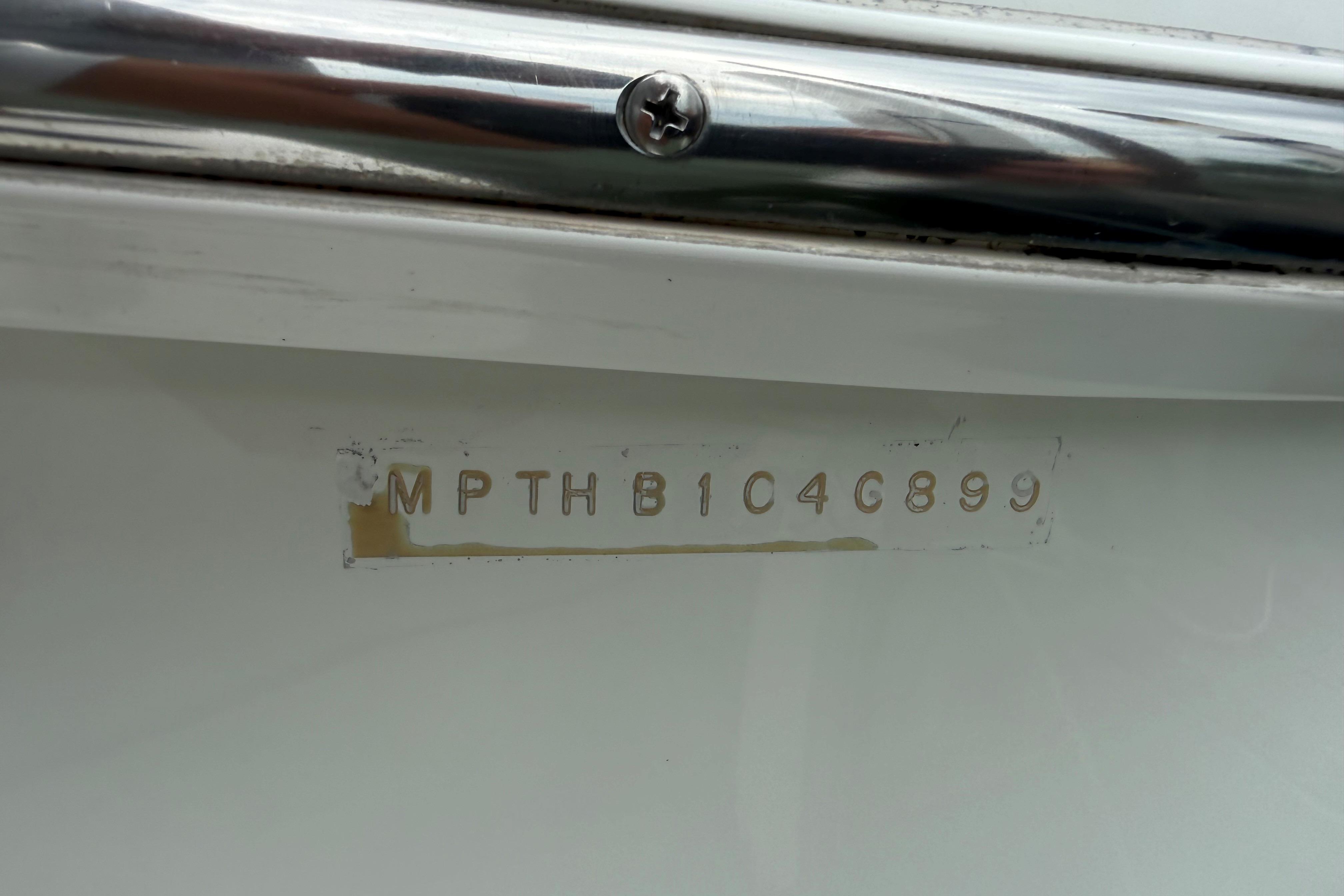 Hull identification number on 1999 Mainship 350 Trawler boat.