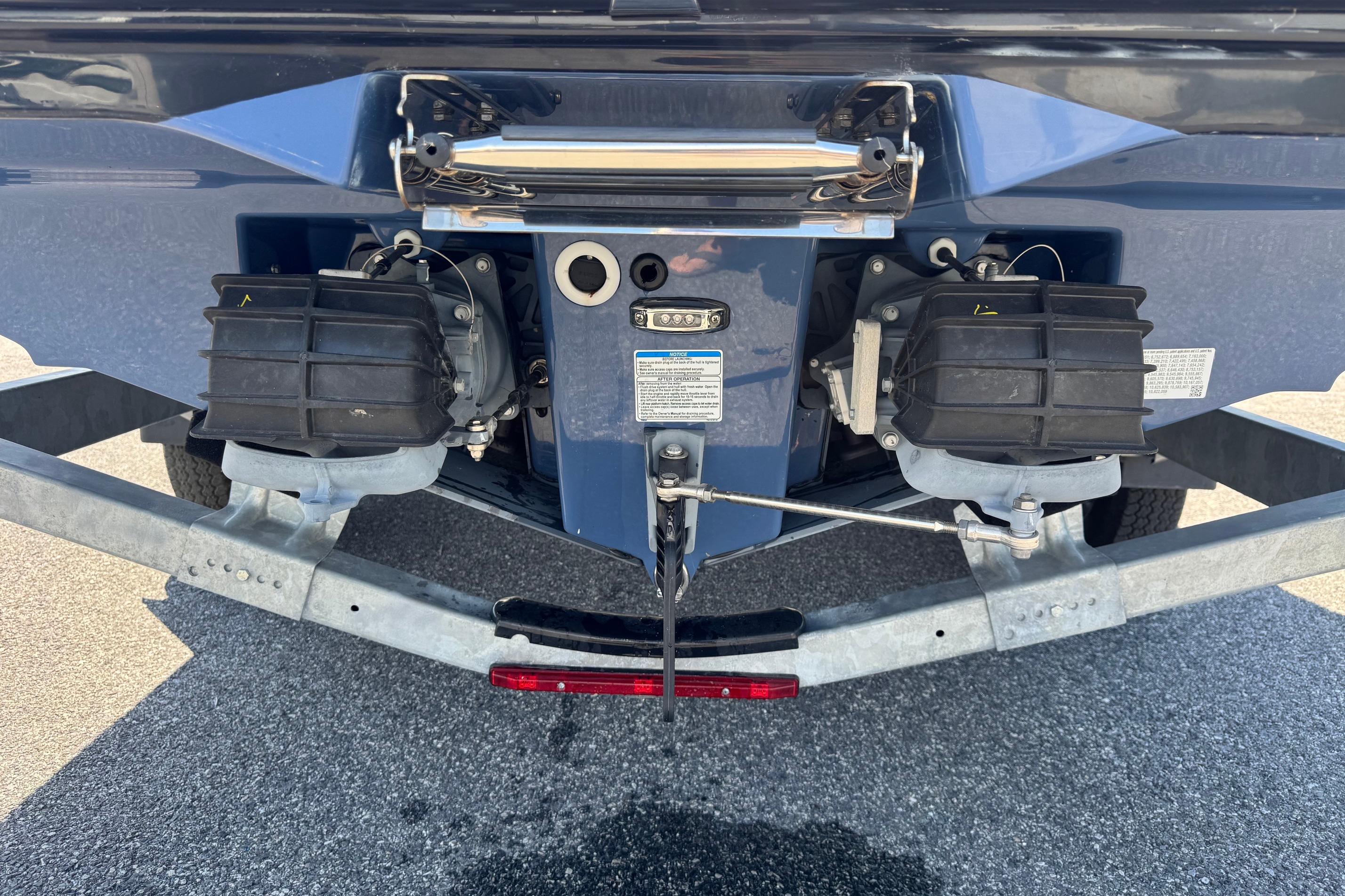 Rear view of 2023 Yamaha Boats 222SD showing dual jet propulsion system.