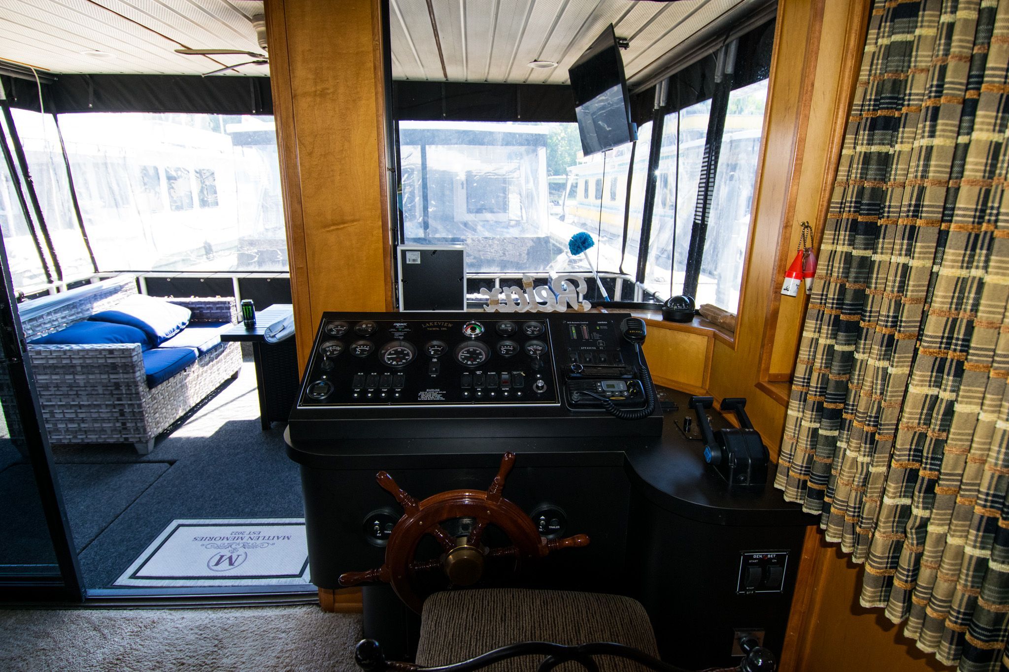 Interior view of a 2003 Lakeview 16x70 houseboat cockpit.
