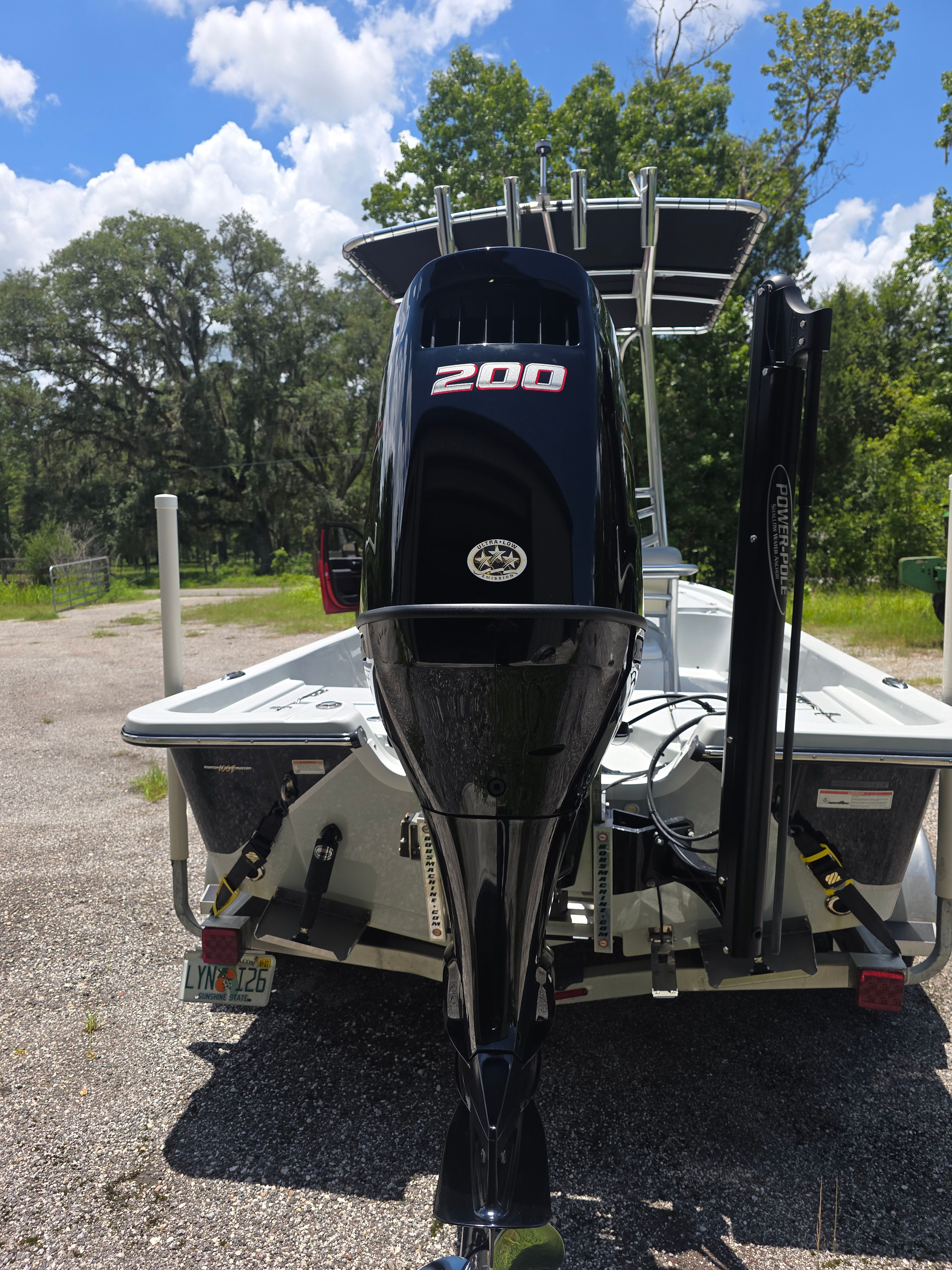 The image shows a 2019 Blazer Bay 2200 boat with a 200 HP outboard motor.