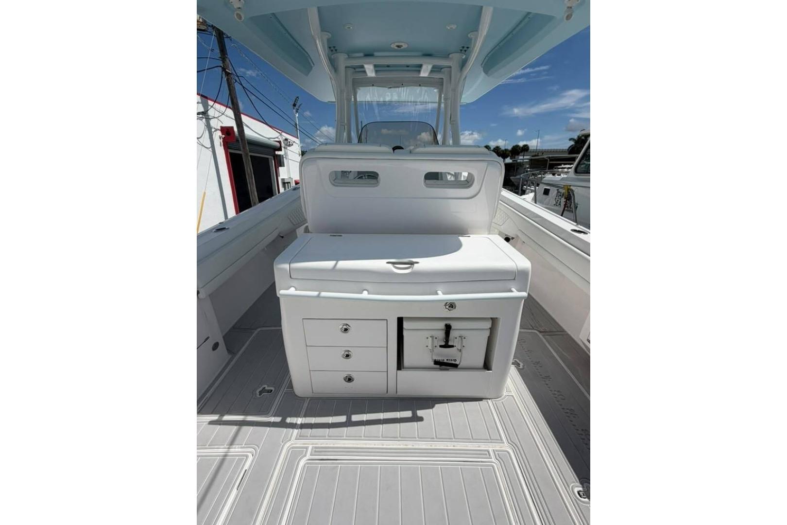 2020 Intrepid 375 Nomad SE boat interior with seating and storage compartments.