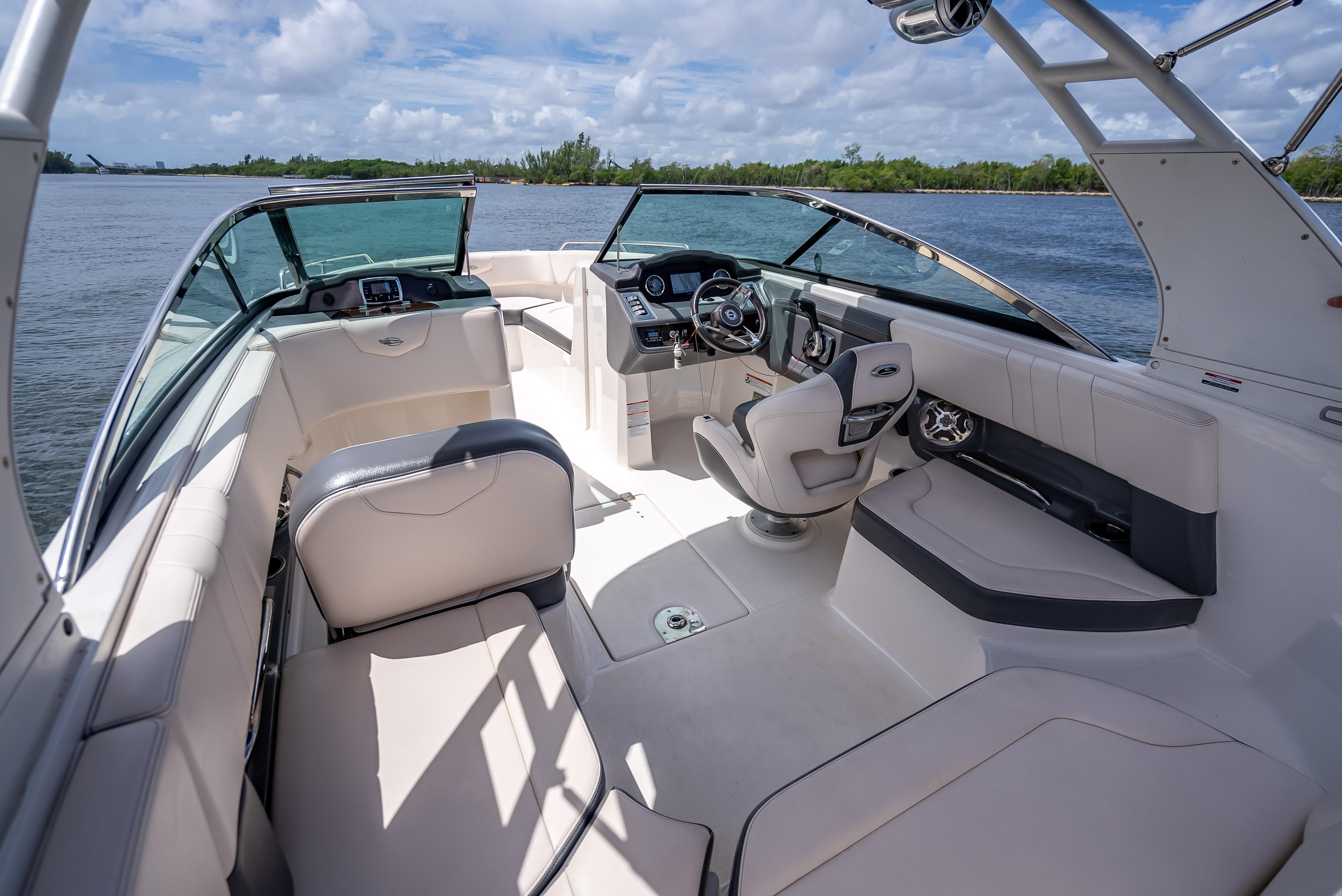 2017 Chaparral 227 SSX boat interior with luxurious seating and modern dashboard.