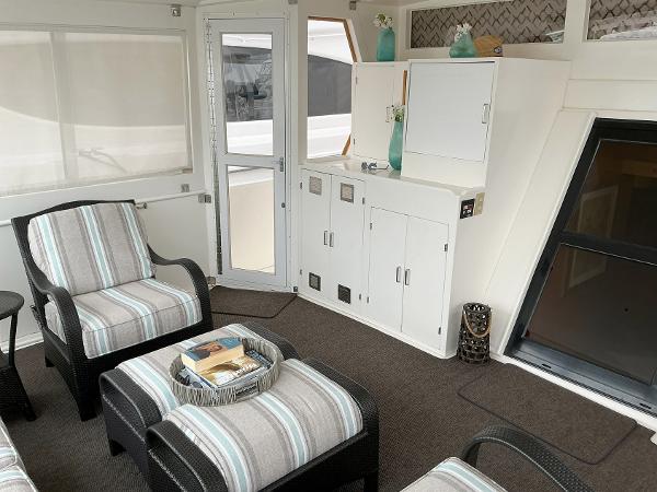 Luxurious interior of 2000 Novatec Islander 55 yacht with elegant seating and decor.