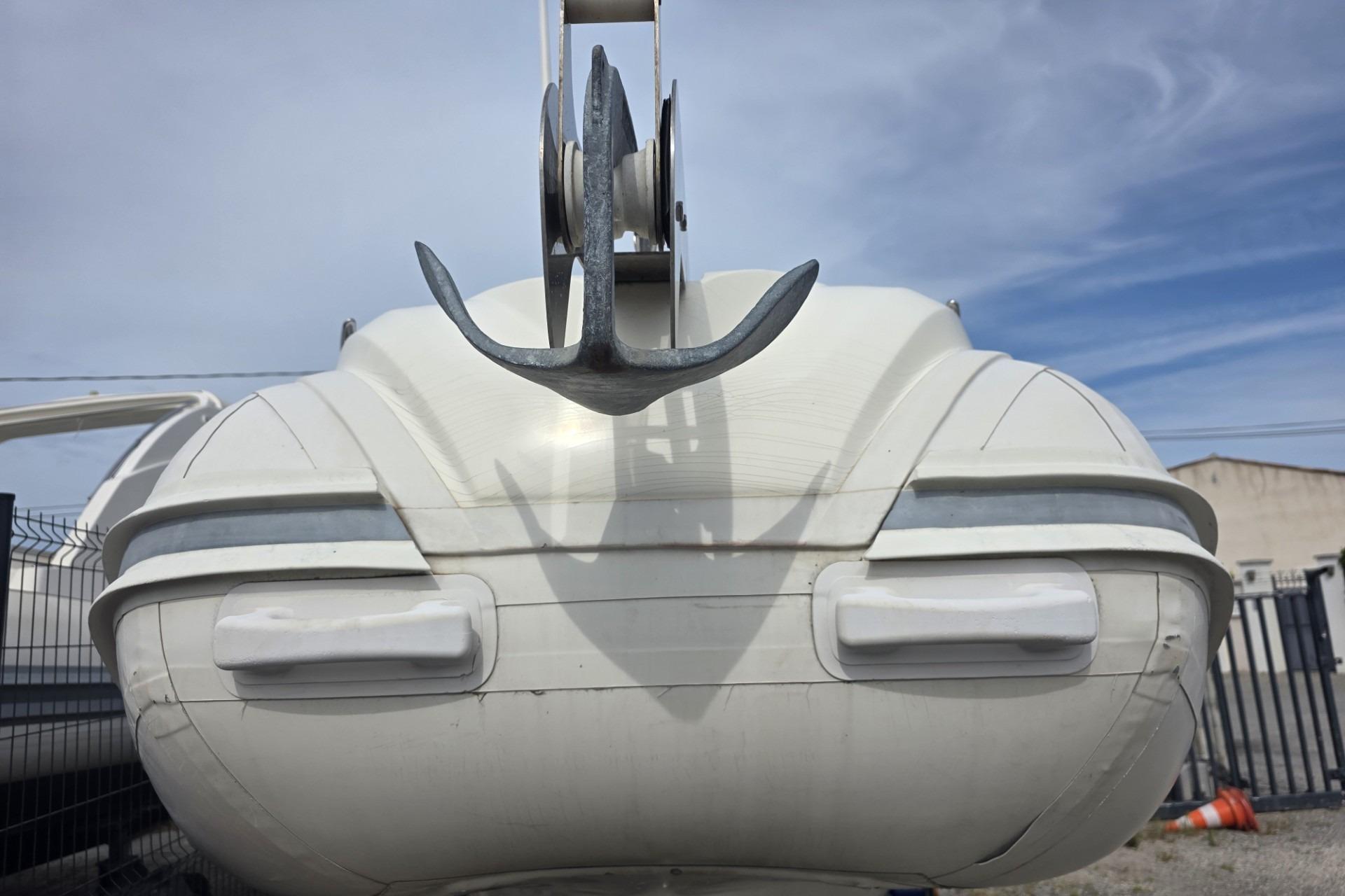 Front view of a 2015 Nuova Jolly 650 boat, showcasing its hull and anchor.