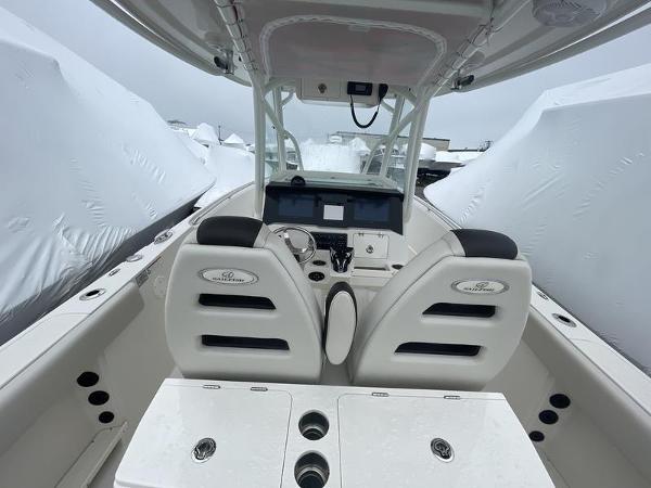 2023 Sailfish 290 CC boat interior with dual seats and modern dashboard.