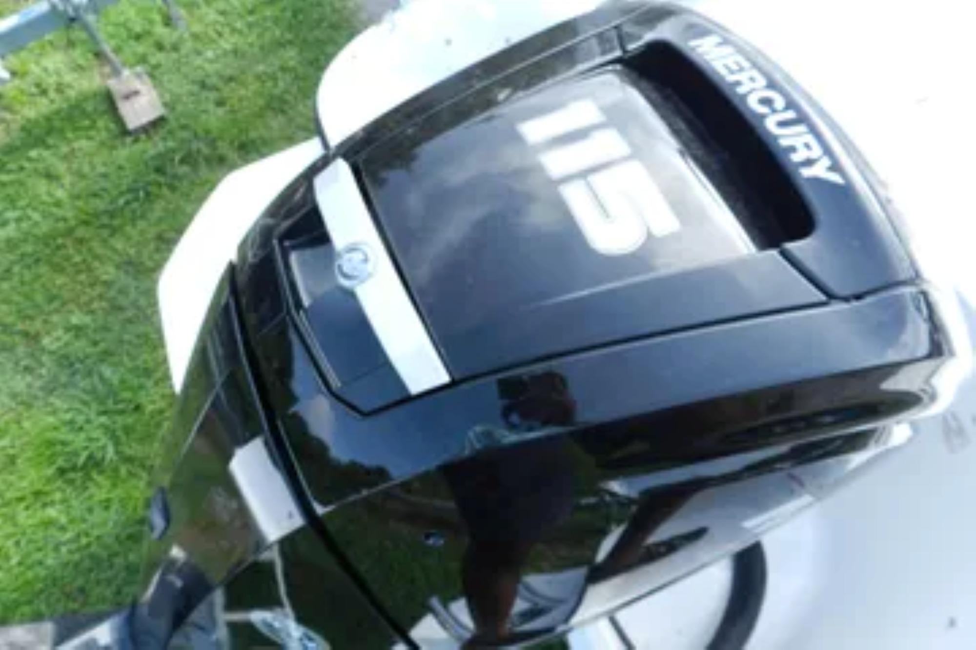Mercury 115 outboard motor on 2026 Bayliner Element E18 boat, viewed from above.