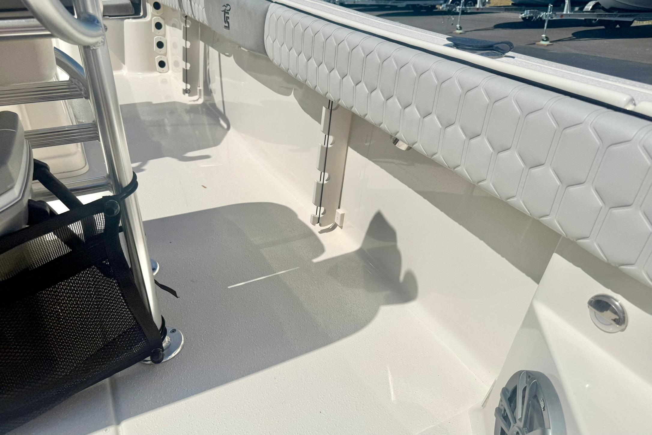 2026 Carolina Skiff 21 Ultra Elite interior with hexagonal upholstery and stainless steel features.