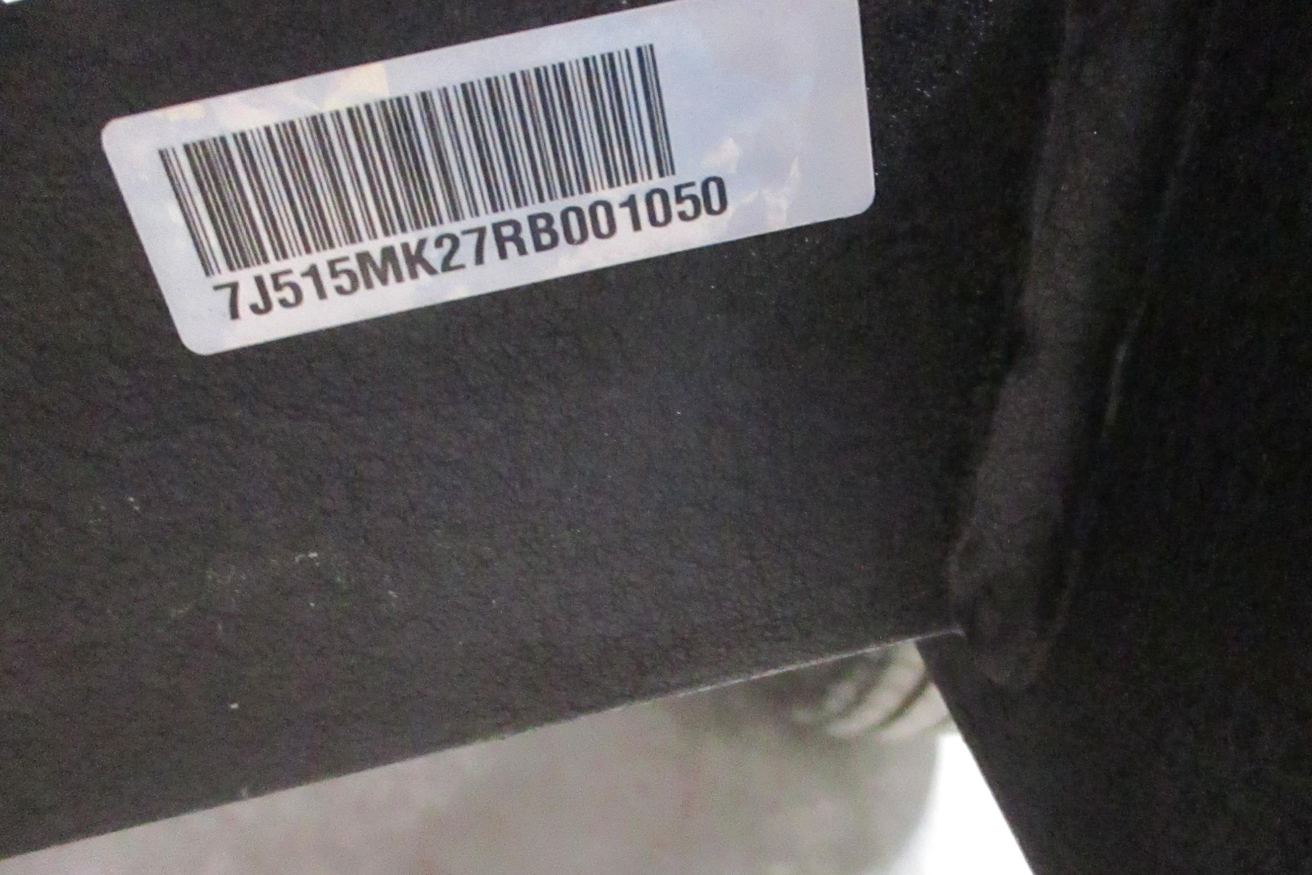 Barcode and serial number on 2024 Tahoe 1950 vehicle component.