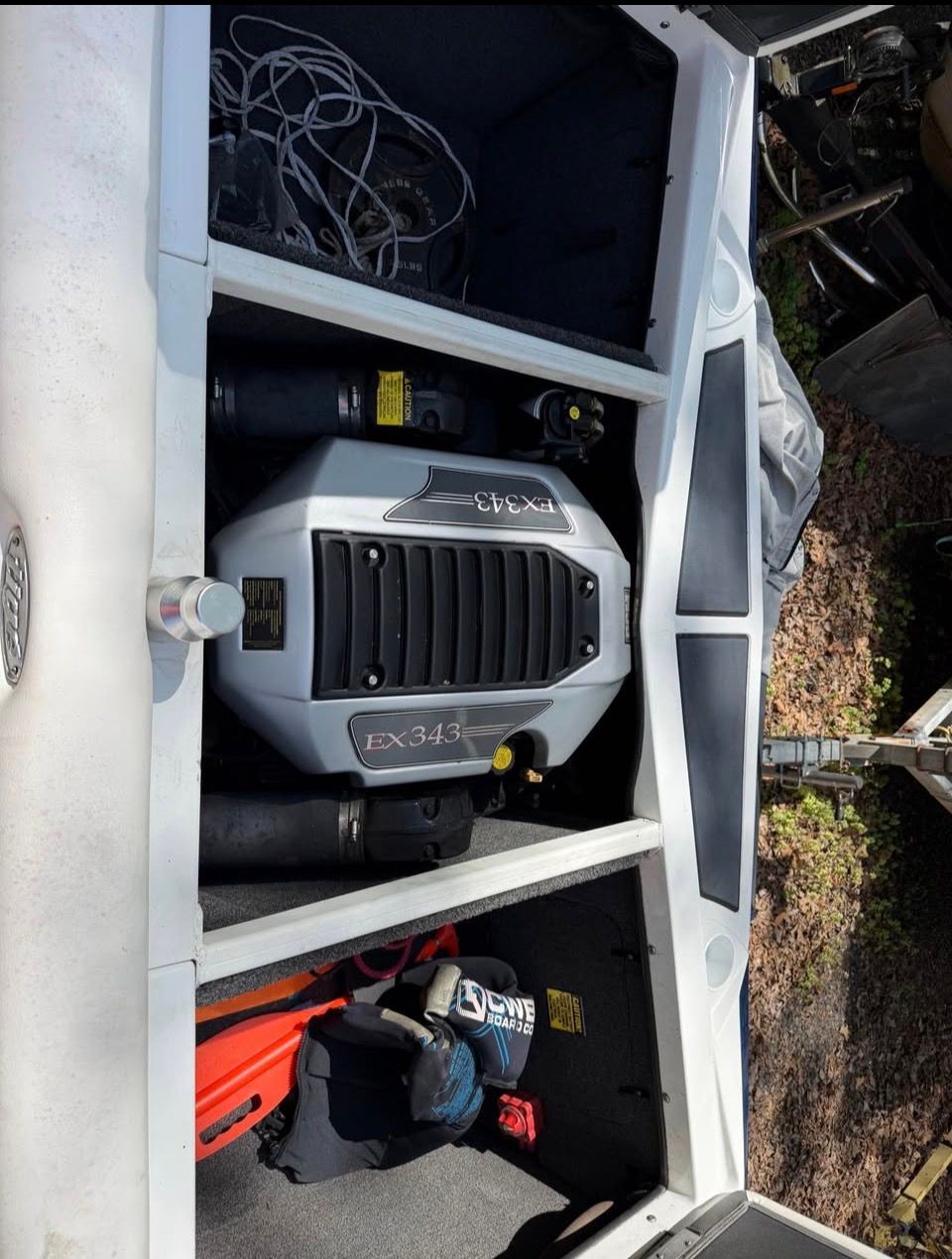 Engine compartment of a 2010 Tigé Z1 boat with EX343 engine.