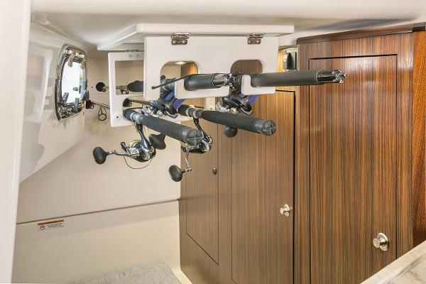 Manufacturer Provided Image: 2021 Pursuit OS 325 Offshore cabin with fishing rod storage.