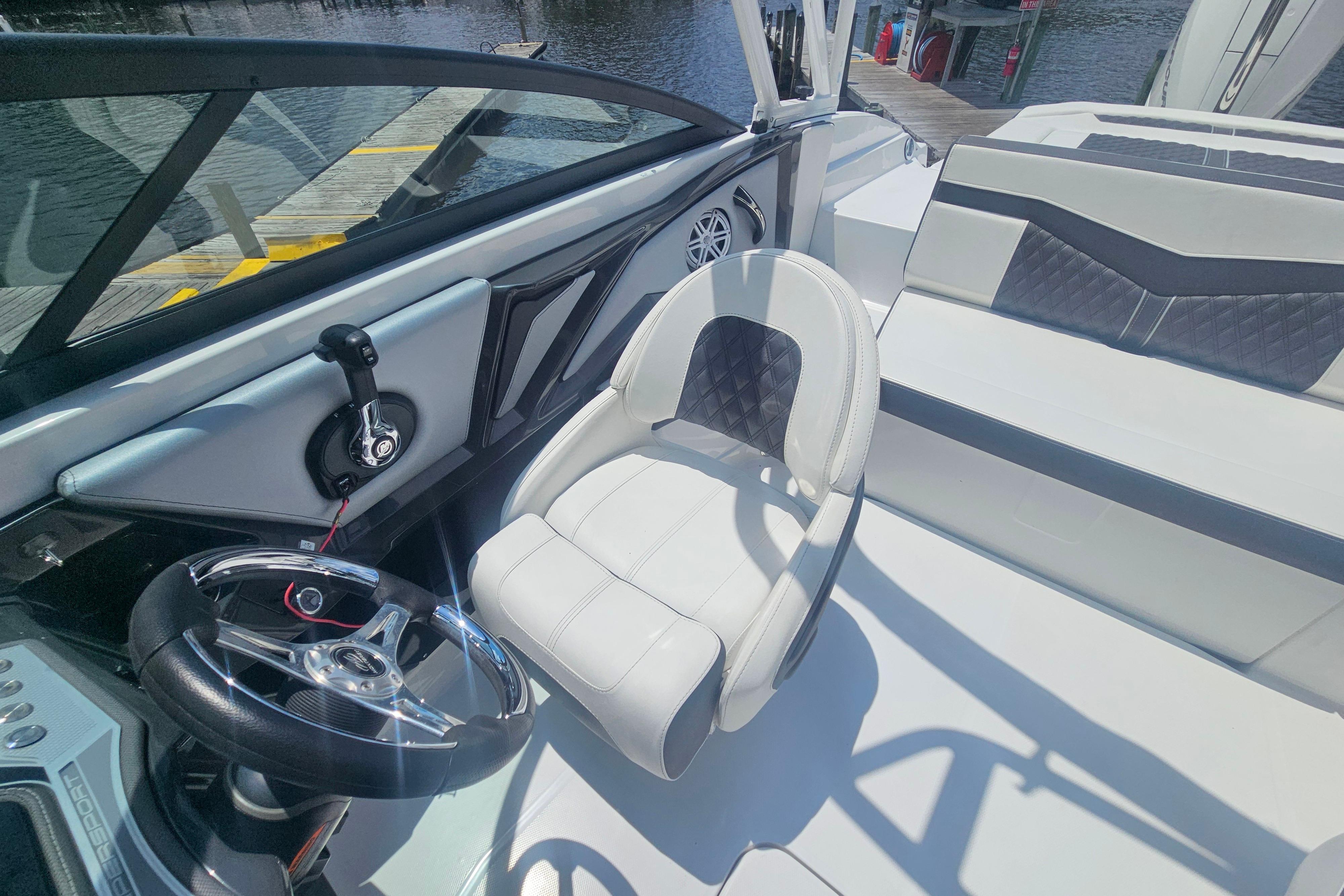 2024 Monterey 215SS Super Sport boat interior with steering wheel and seating.