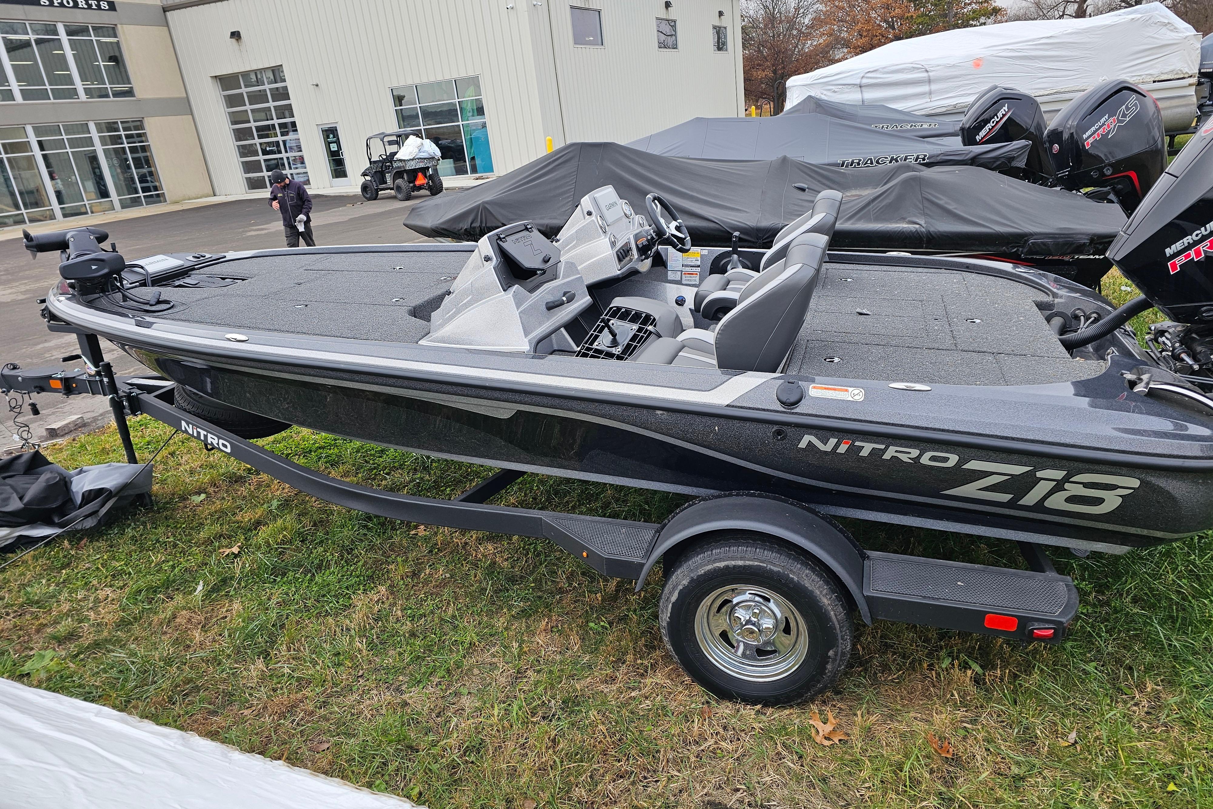 2025 Nitro Z18 Pro boat on trailer, parked outdoors near dealership.