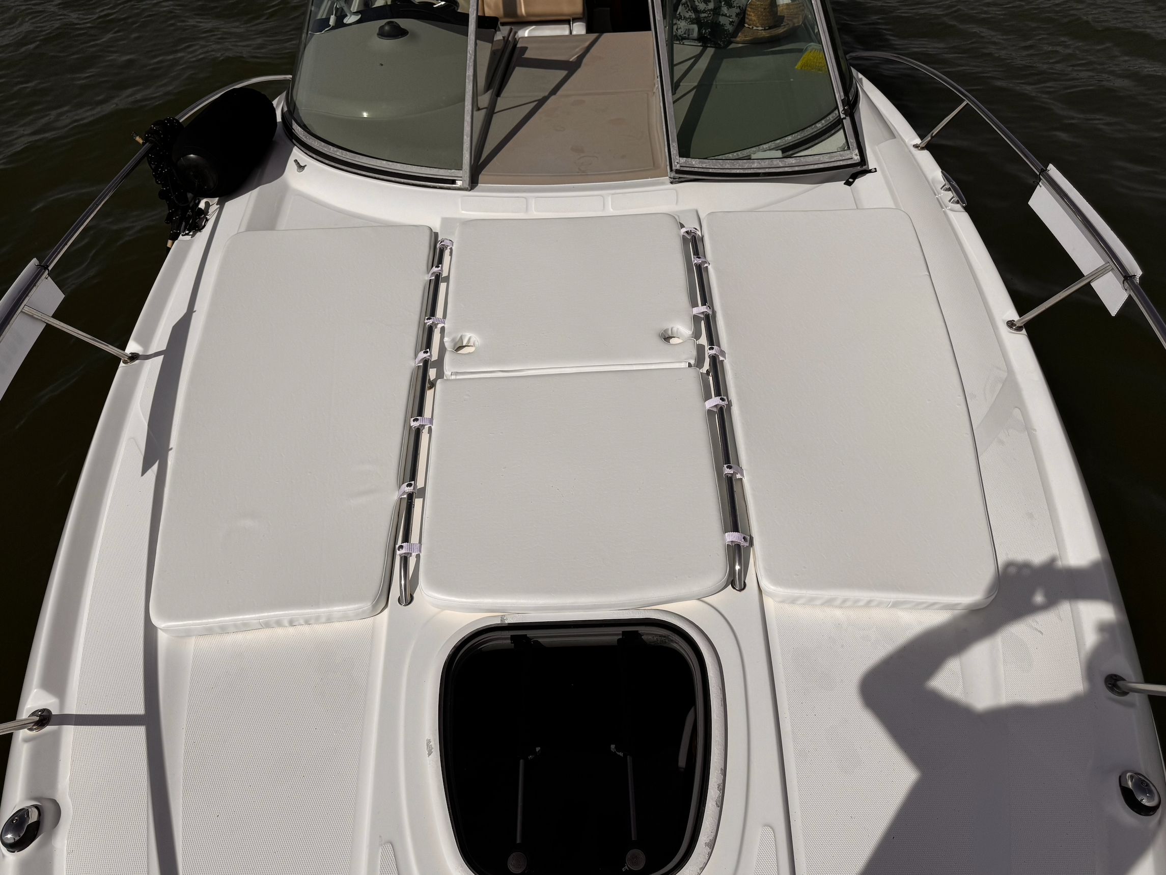 2008 Sea Ray Sundancer 310 boat deck with sun pads.