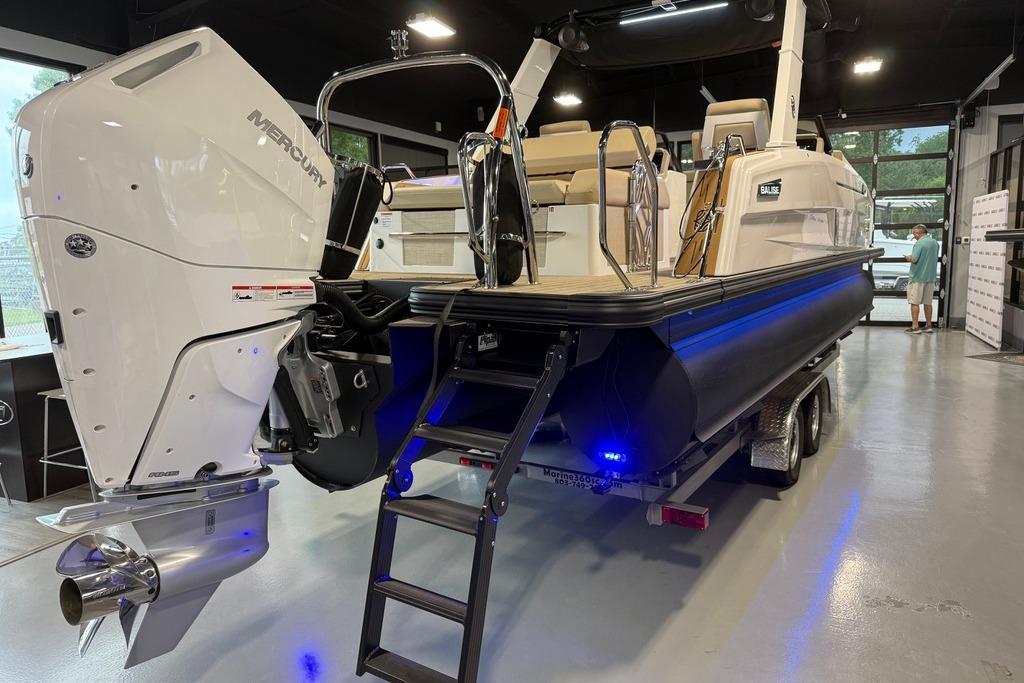 Balise Helix 26 L boat, 2025 model, on trailer with Mercury outboard motor.