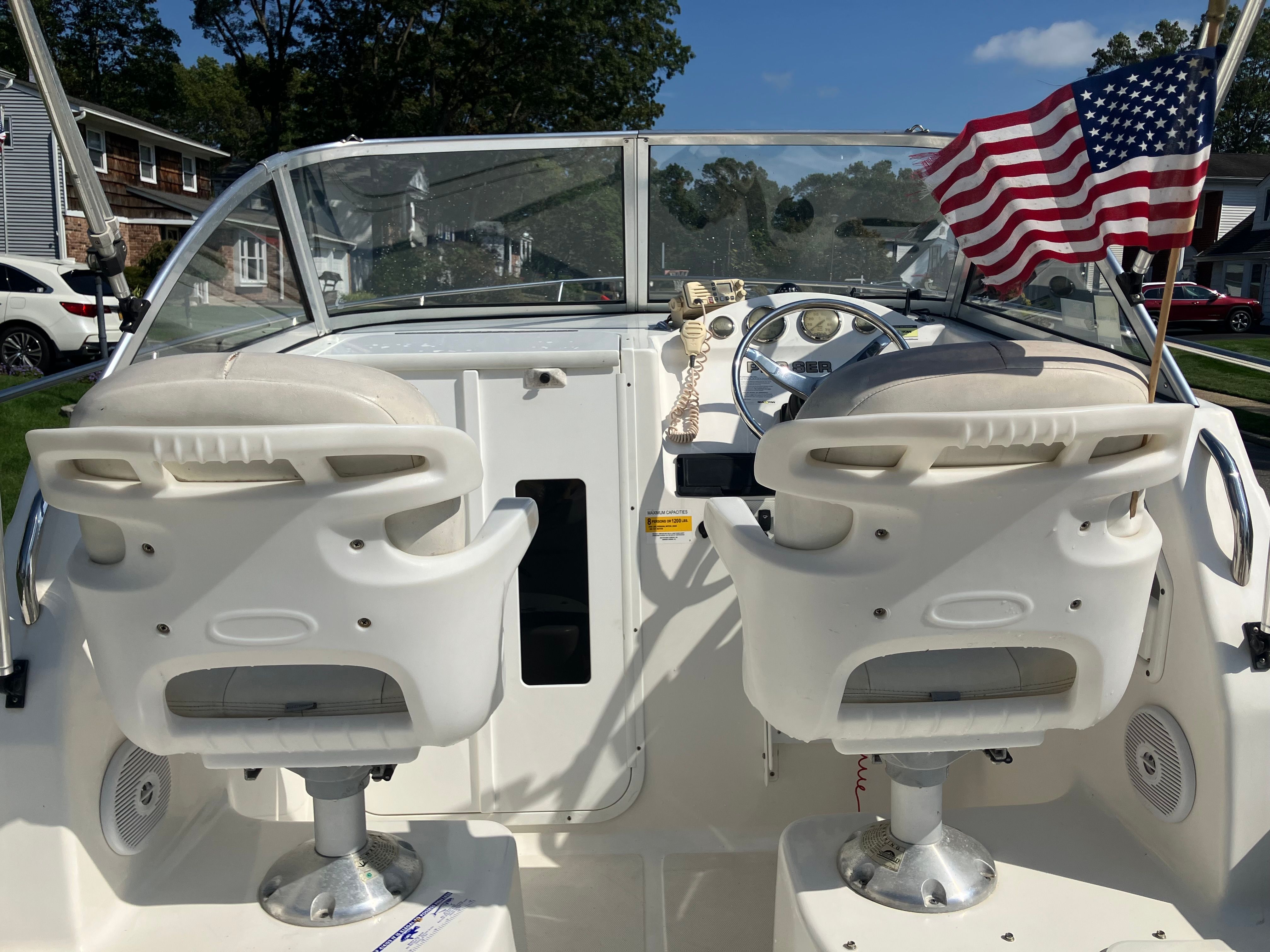 Interior of a 2010 Custom 216wa pro boat with American flag.