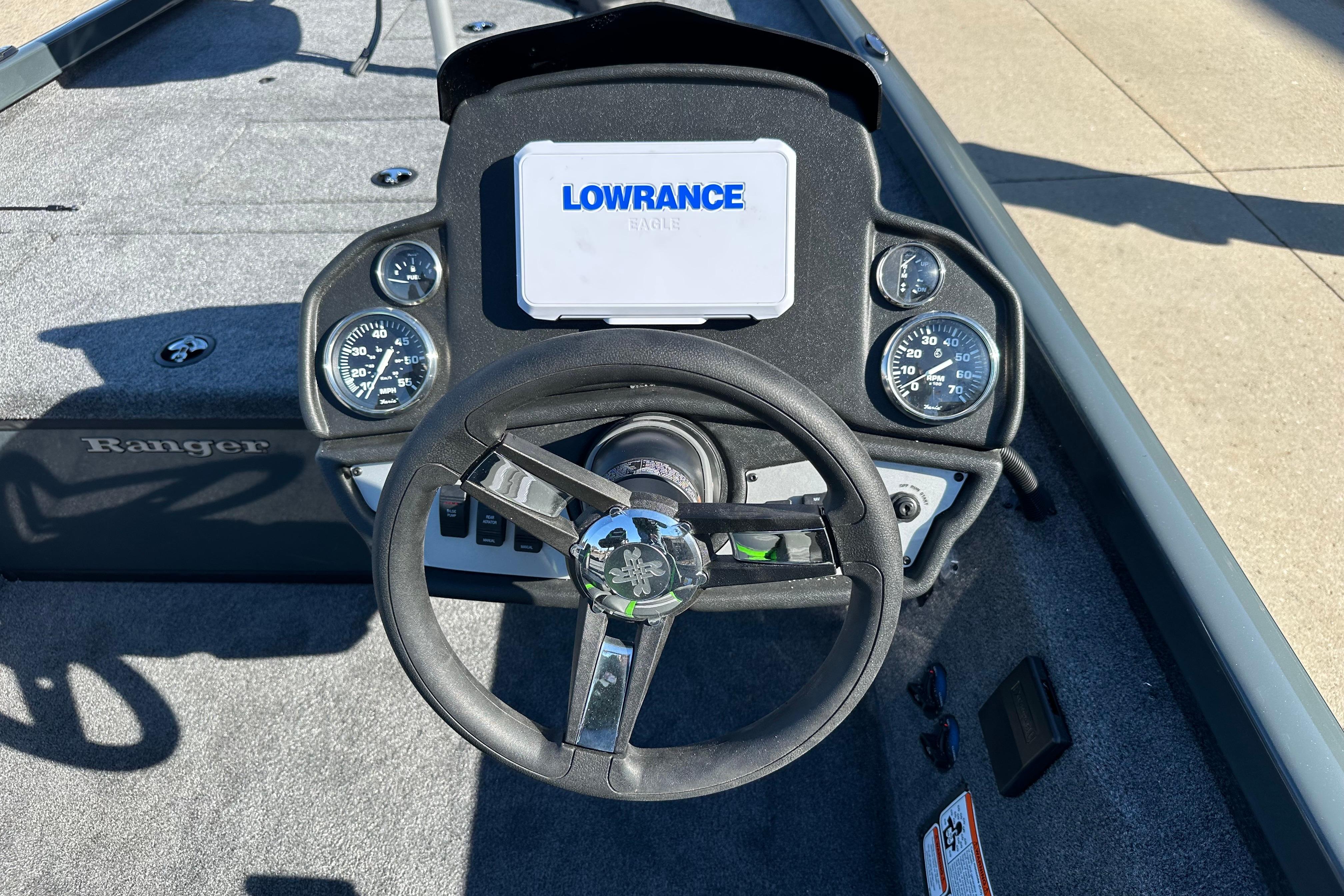 2026 Ranger RT178C boat dashboard with steering wheel and Lowrance display.