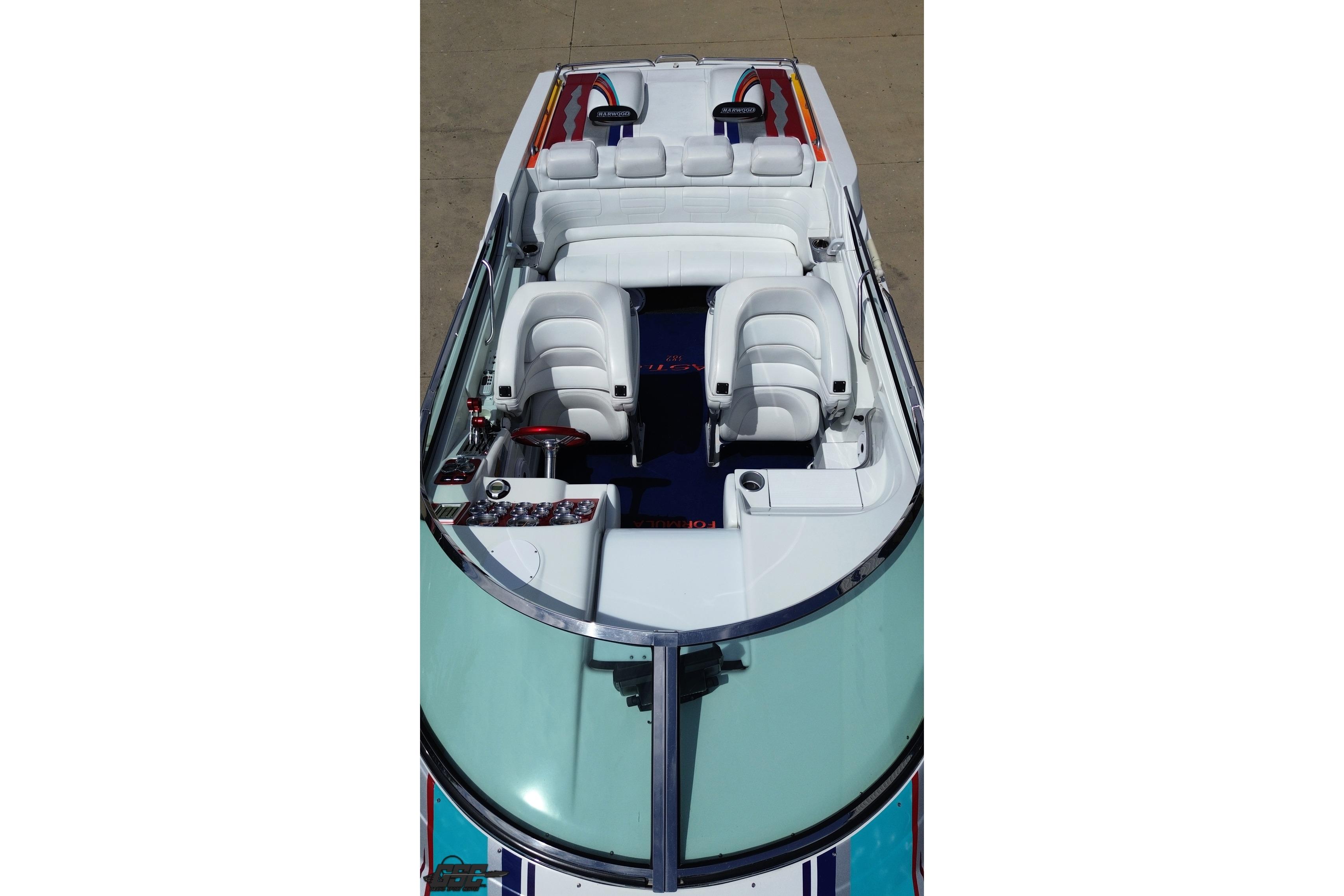 2002 Formula 382 FASTech boat interior with white seating and sleek design.