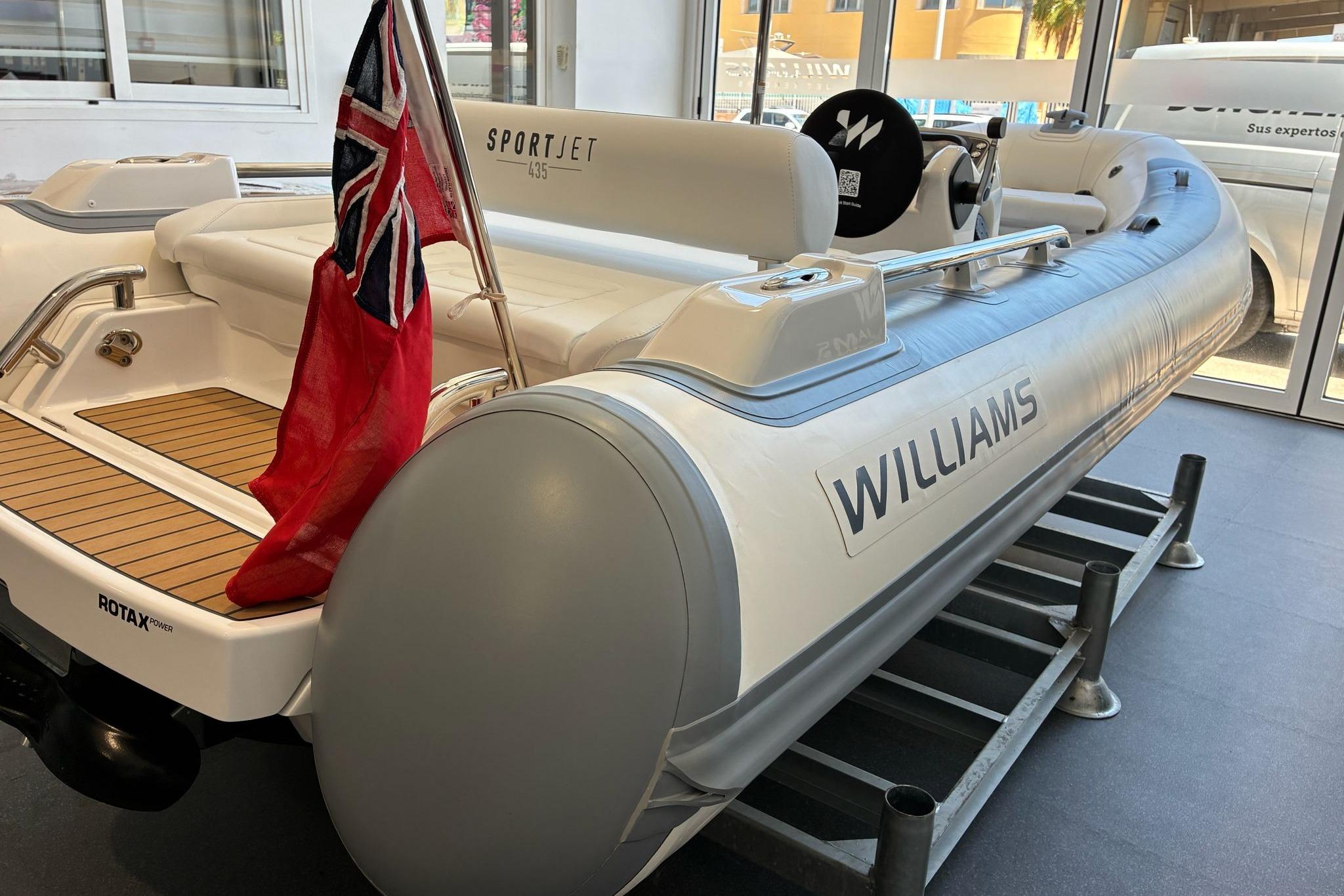 2026 Williams Jet Tenders Sportjet 435 in showroom, featuring sleek design and Rotax engine.