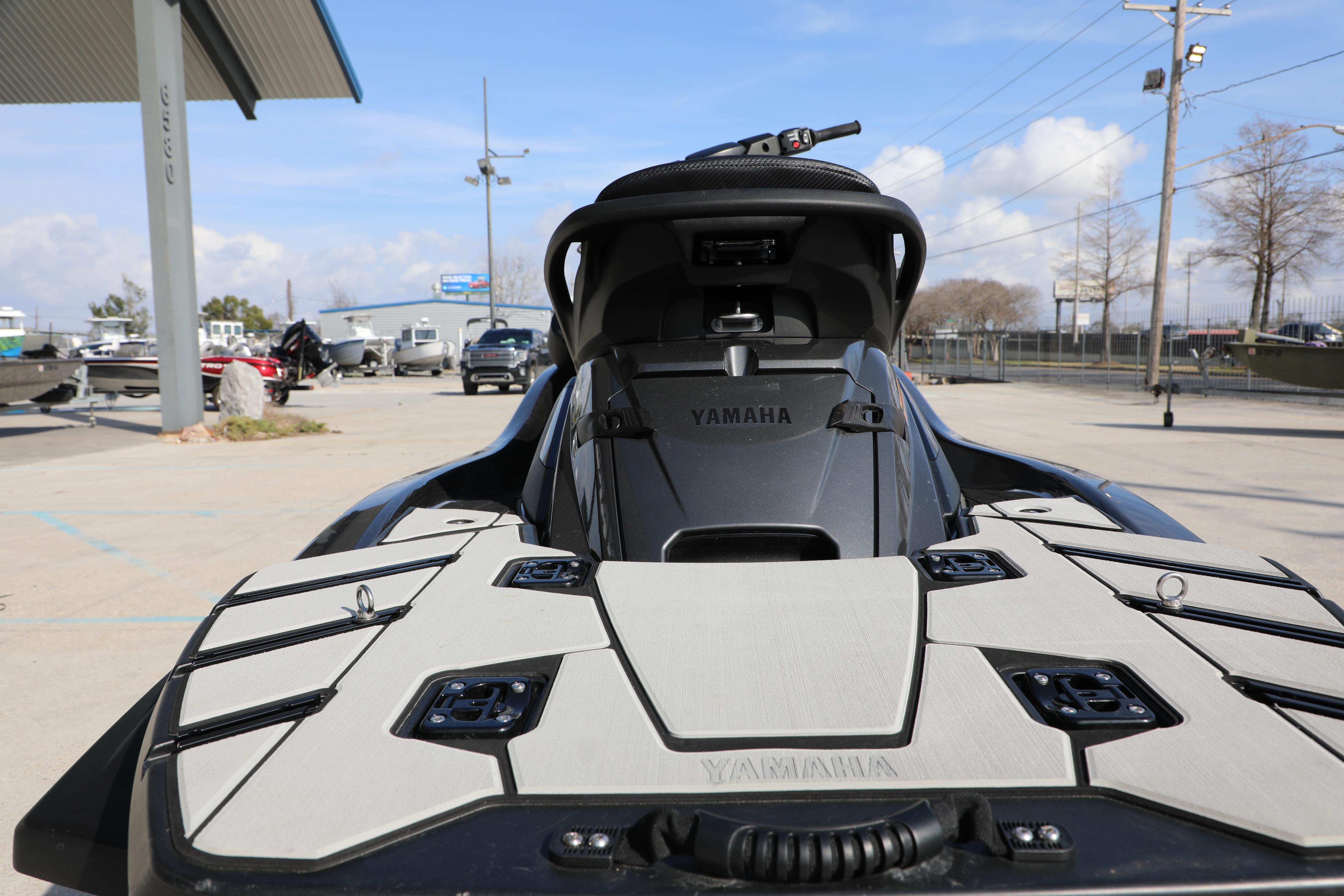 2025 Yamaha WaveRunner FX HO jet ski displayed outdoors, showcasing sleek design and features.