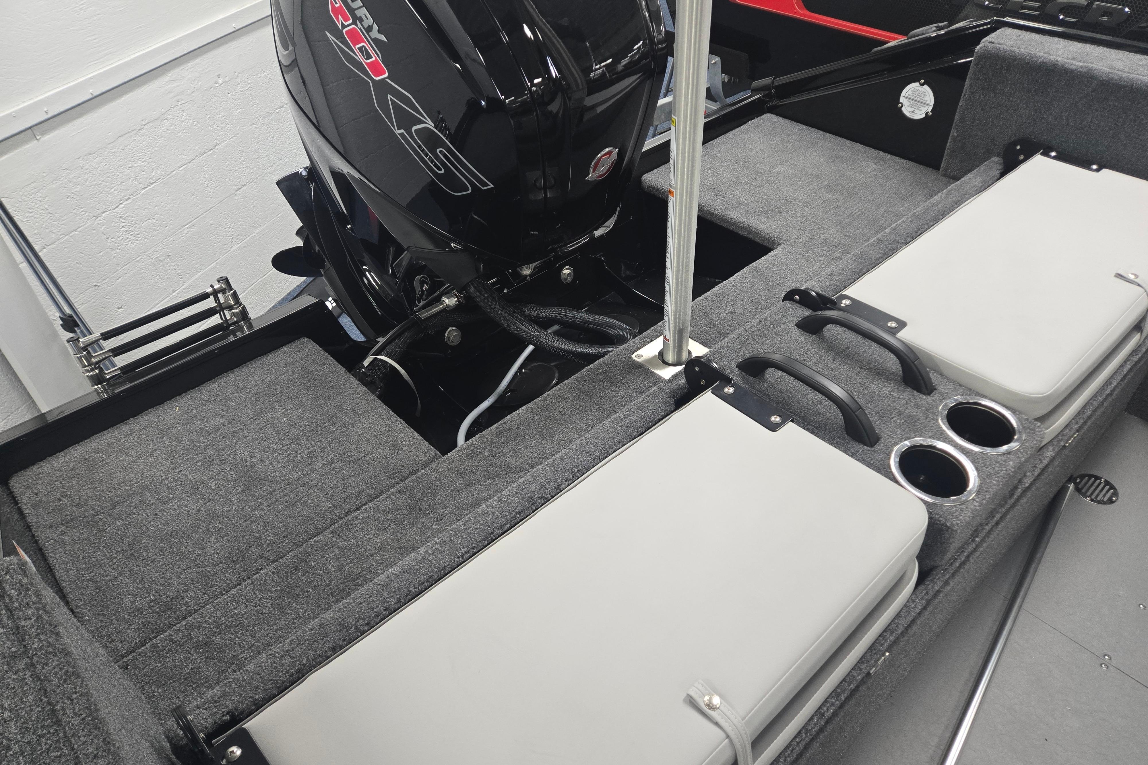 2026 Princecraft Sport 175 MAX boat interior with motor, seating, and cup holders.