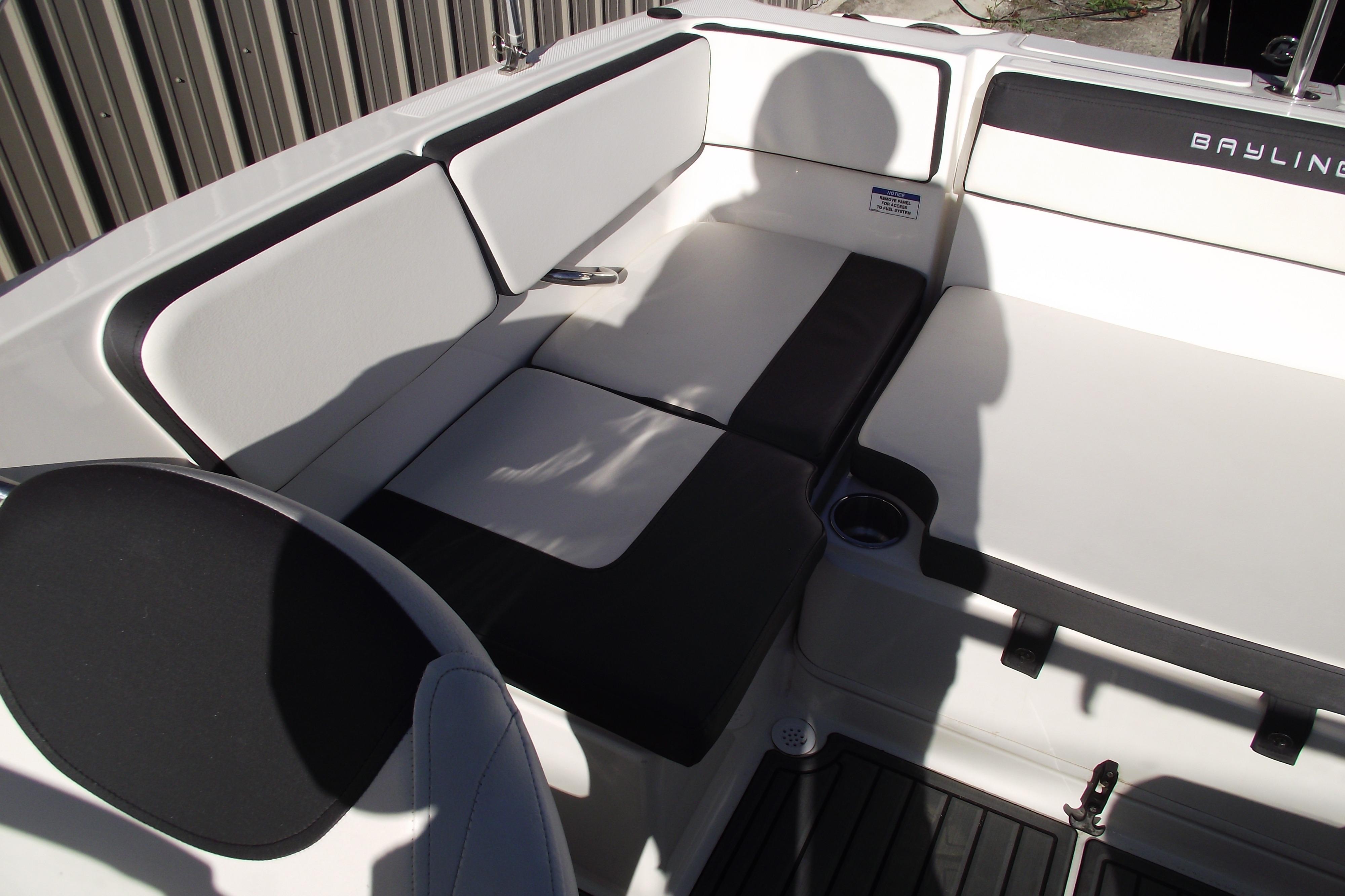 2022 Bayliner VR4 Bowrider OB interior seating with black and white upholstery.