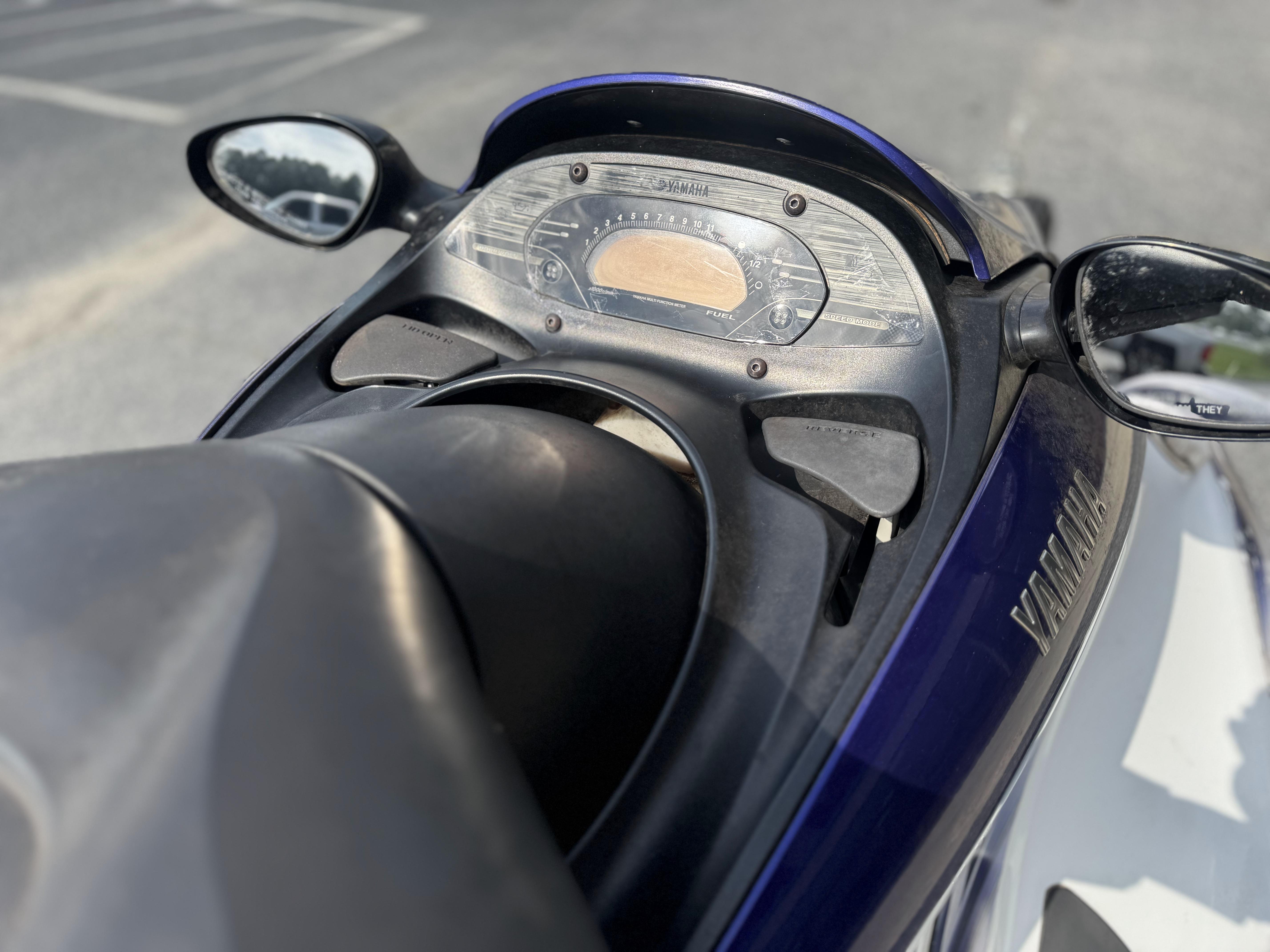 2003 Yamaha WaveRunner FX140 dashboard with mirrors and controls in focus.
