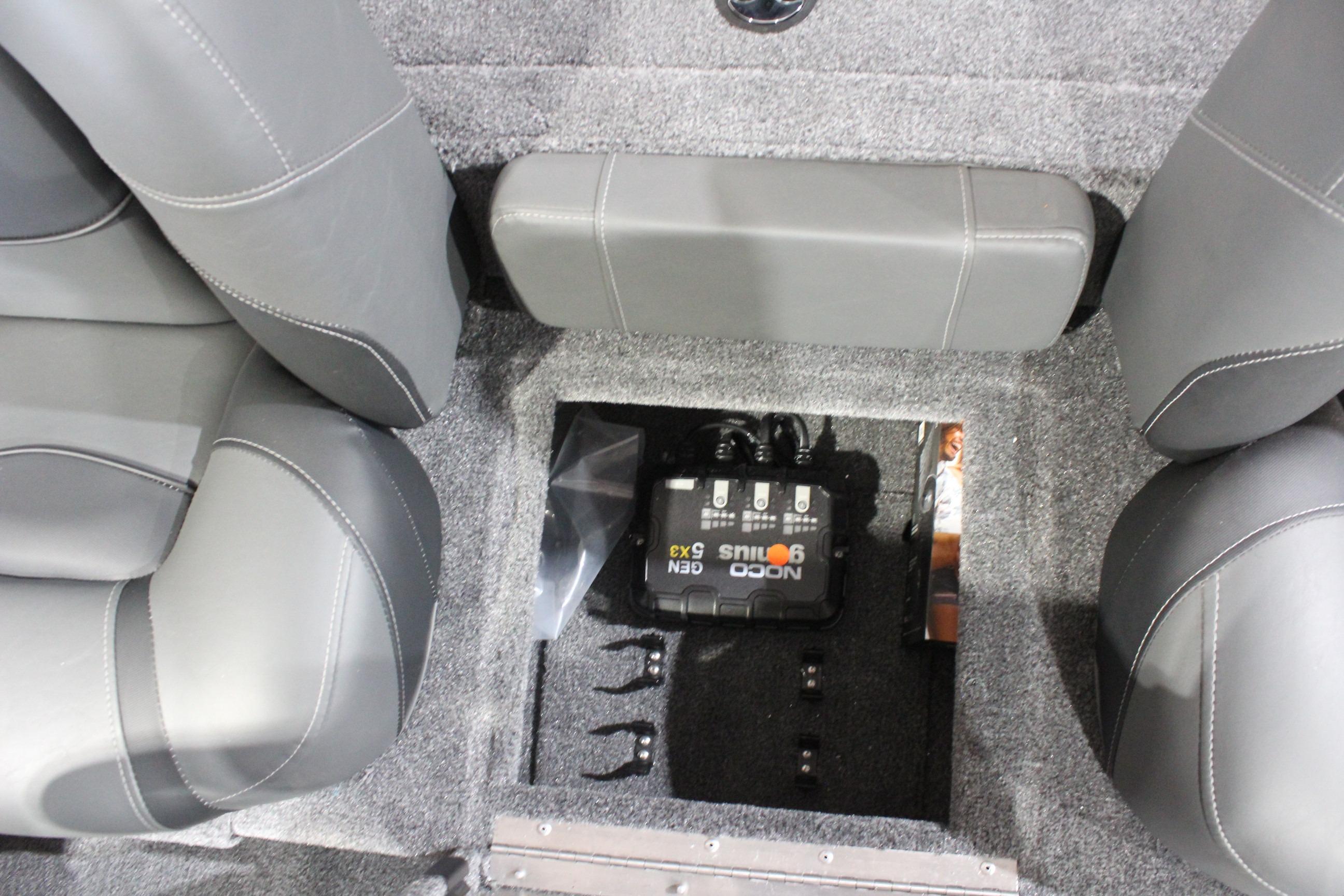 Interior of 2026 Tracker Pro Team 175 boat with NOCO Genius battery charger.