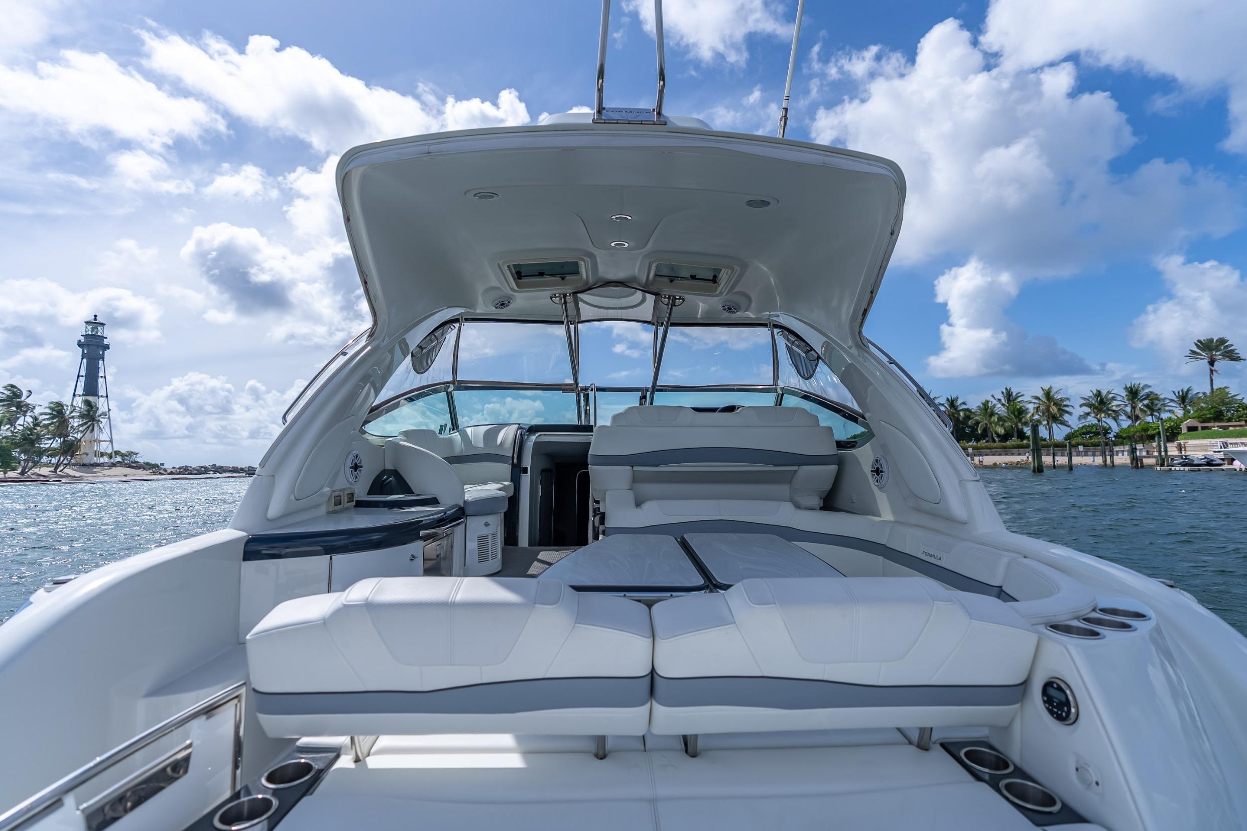 2022 Formula 40 Performance Cruiser on water, featuring spacious deck and luxurious seating.