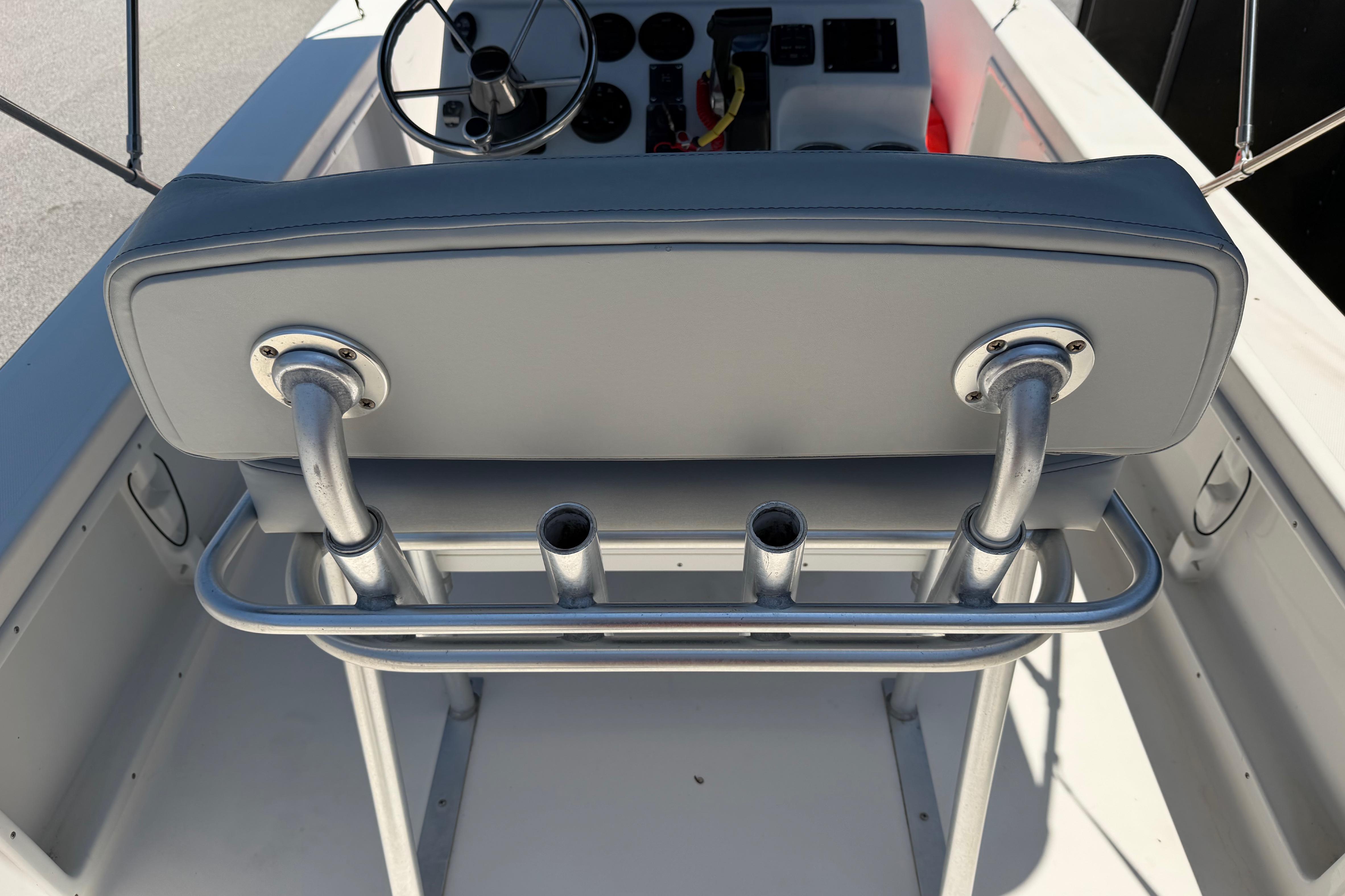 2008 KenCraft Bay Rider 2060 boat interior with steering console and rod holders.