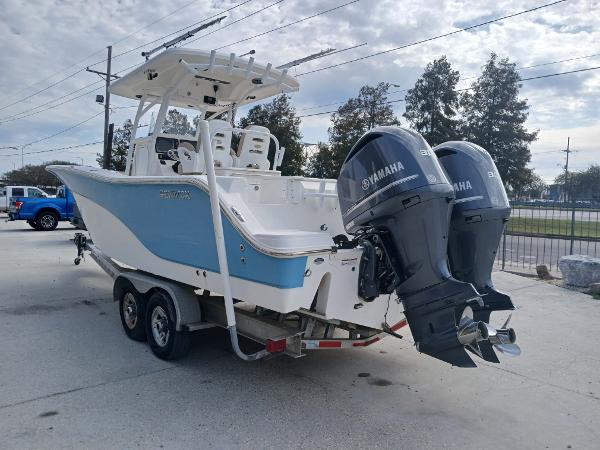 2015 Sea Fox 286 Commander boat with twin Yamaha engines on a trailer.