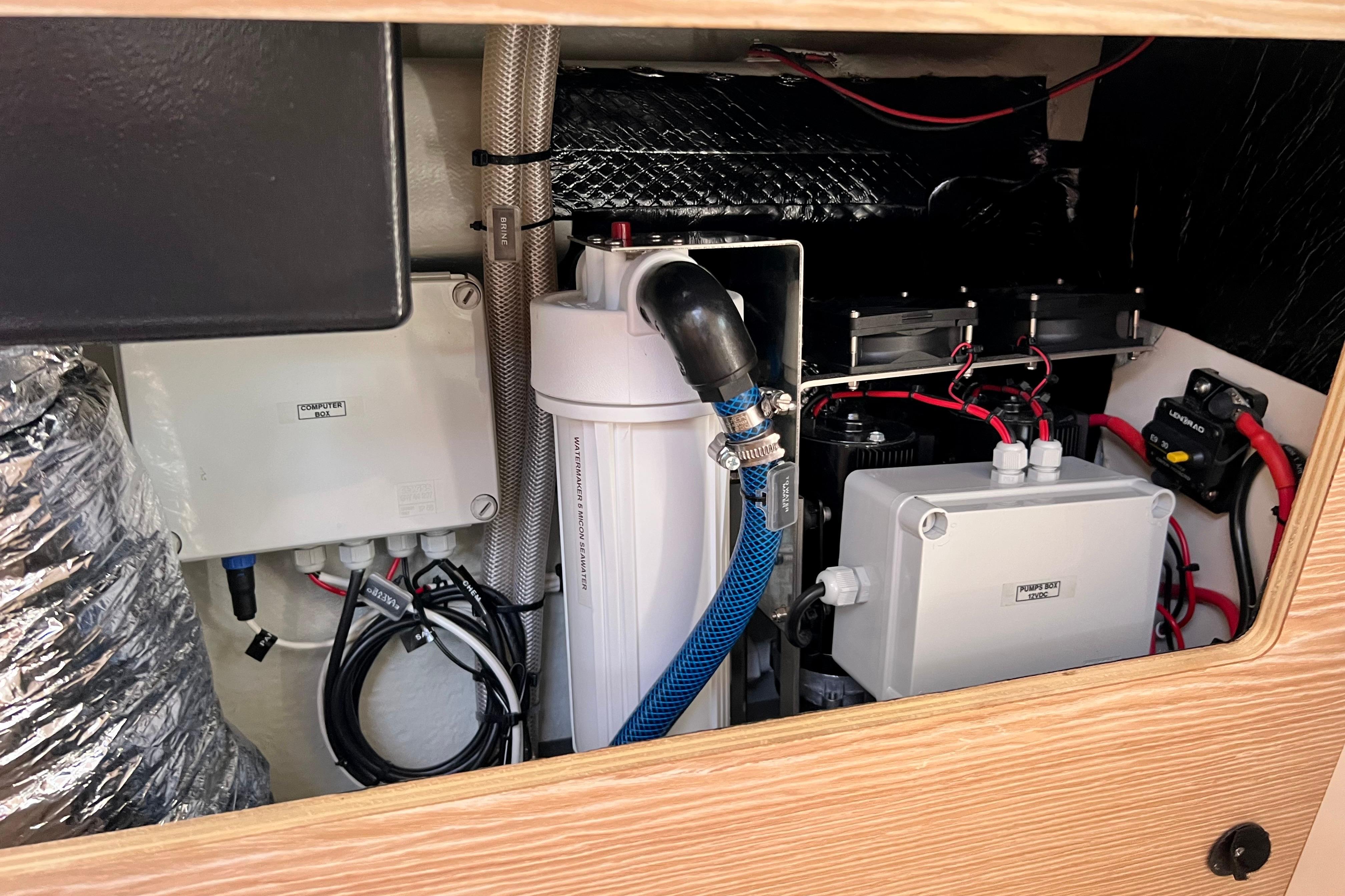 Electrical and plumbing systems inside a 2016 Hanse 455 yacht.