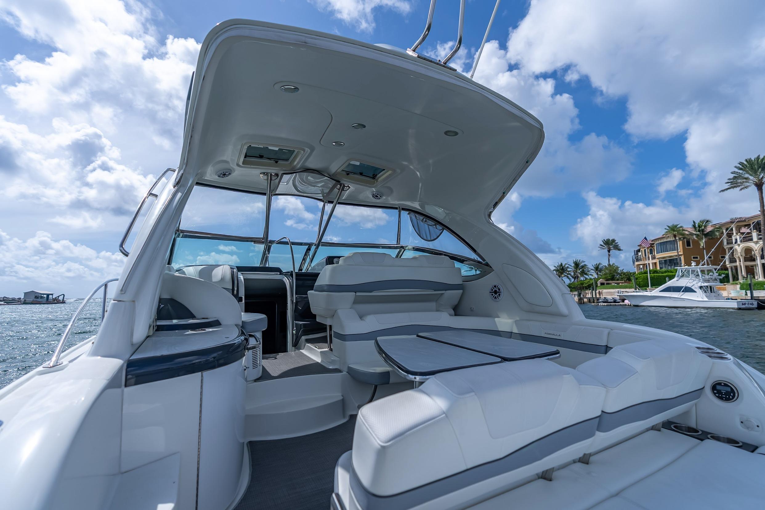 2022 Formula 40 Performance Cruiser interior with seating, under a blue sky.
