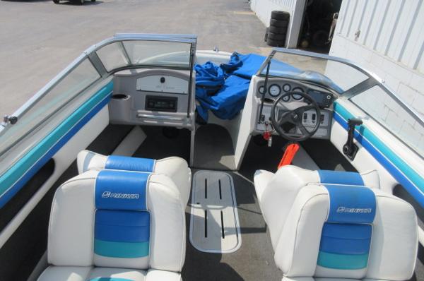 1993 Rinker 186 Captiva boat interior with blue and white seating.