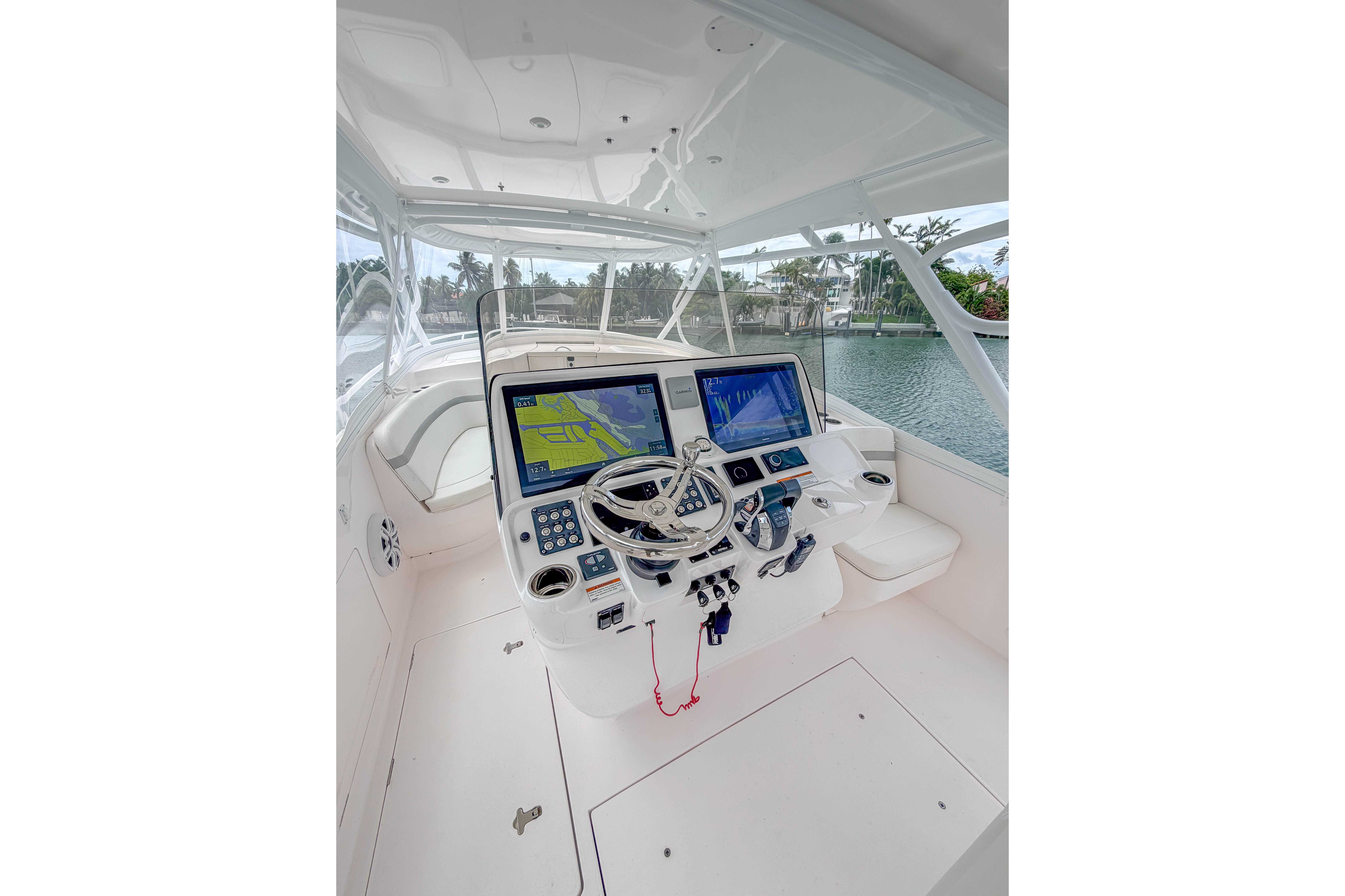 2021 Intrepid 409 Valor boat helm with dual navigation screens and sleek design.