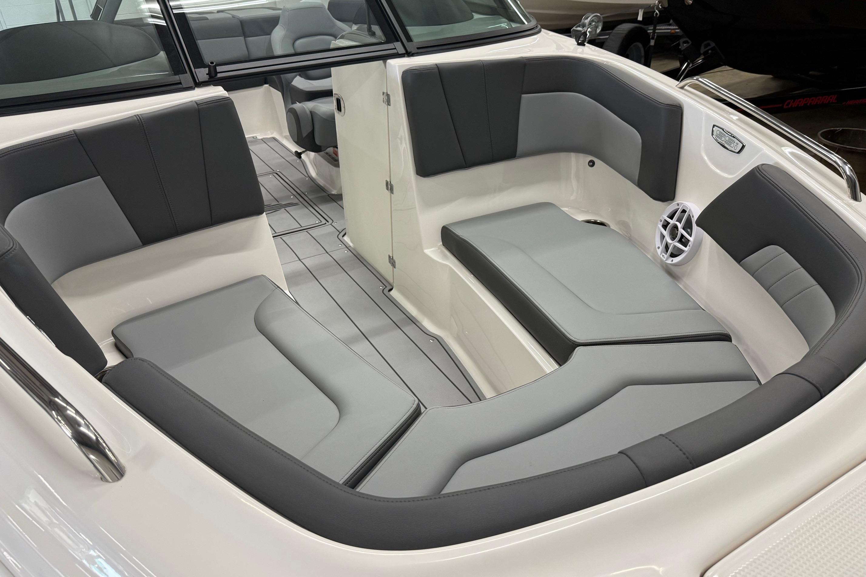 2026 Chaparral 23 SSi boat interior with sleek gray seating and modern design.