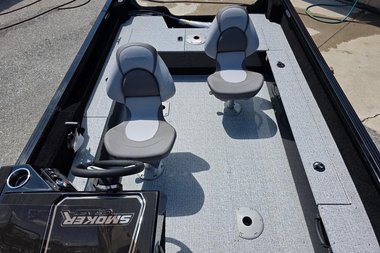 2026 Smoker Craft Pro Angler 165 SC interior with two seats and steering console.