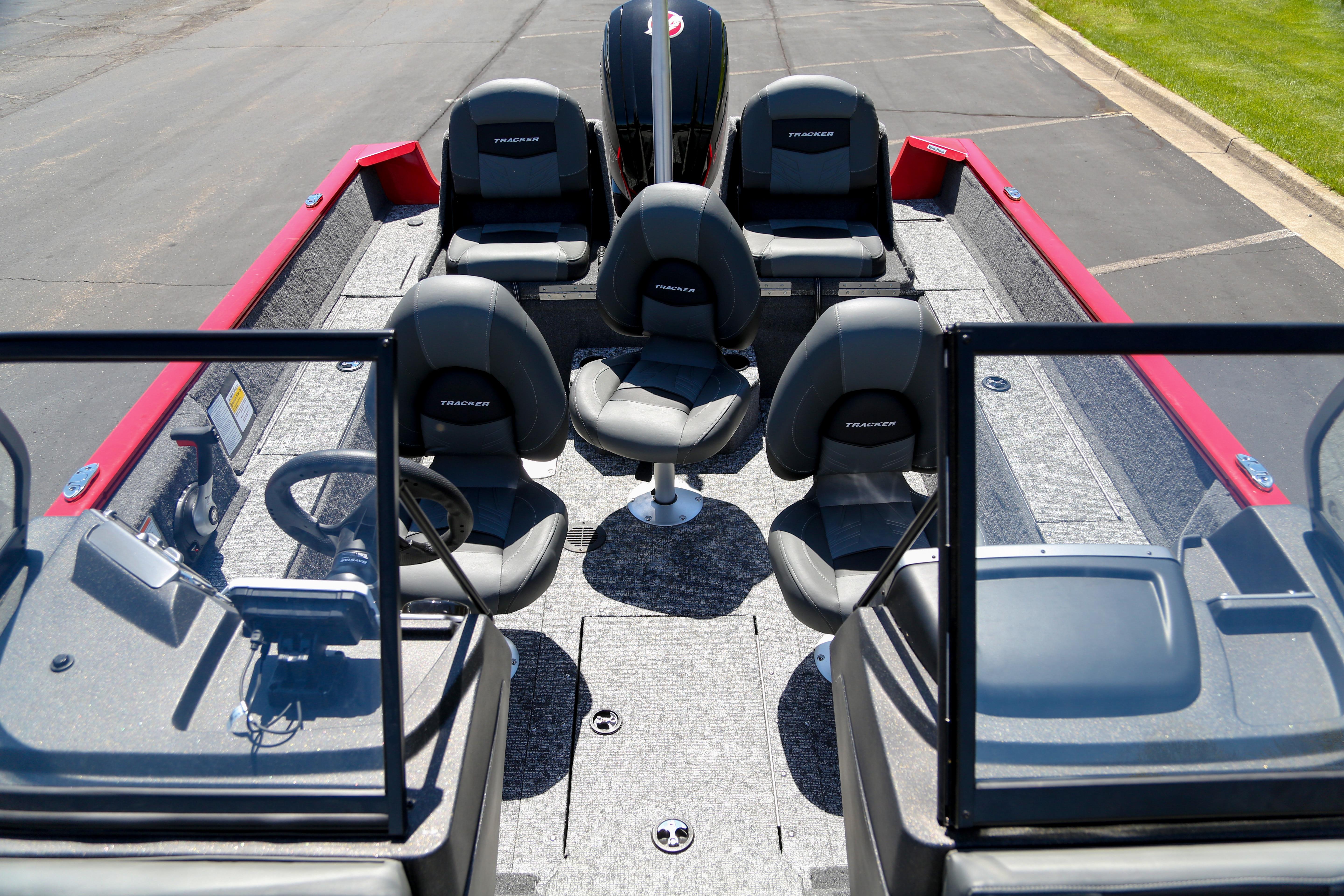 2026 Tracker Pro Guide V-175 Combo boat interior with seating and steering wheel.
