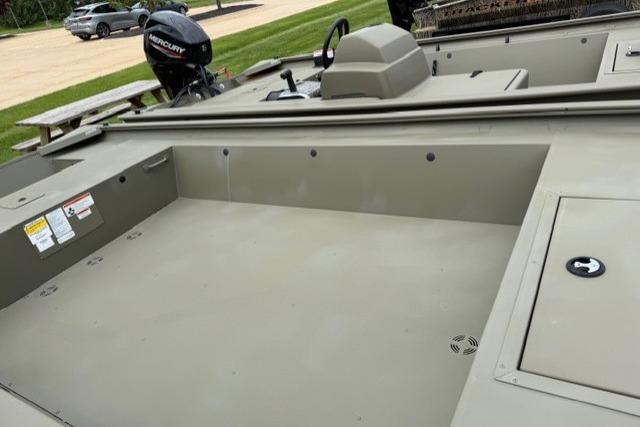 2025 Tracker Grizzly 1754 Jon boat interior with Mercury outboard motor.
