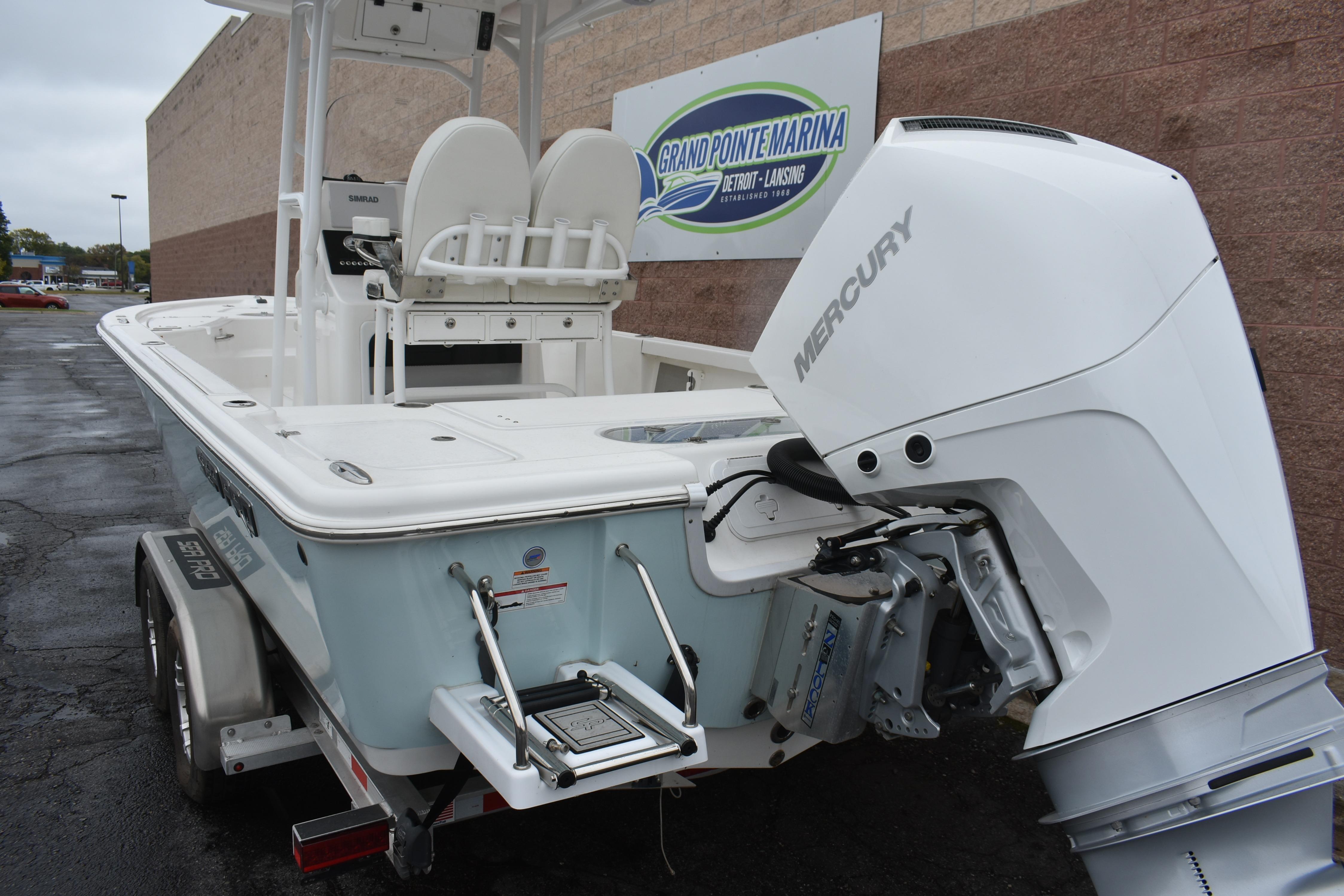 2025 Sea Pro 250 Bay boat with Mercury engine at Grand Pointe Marina.