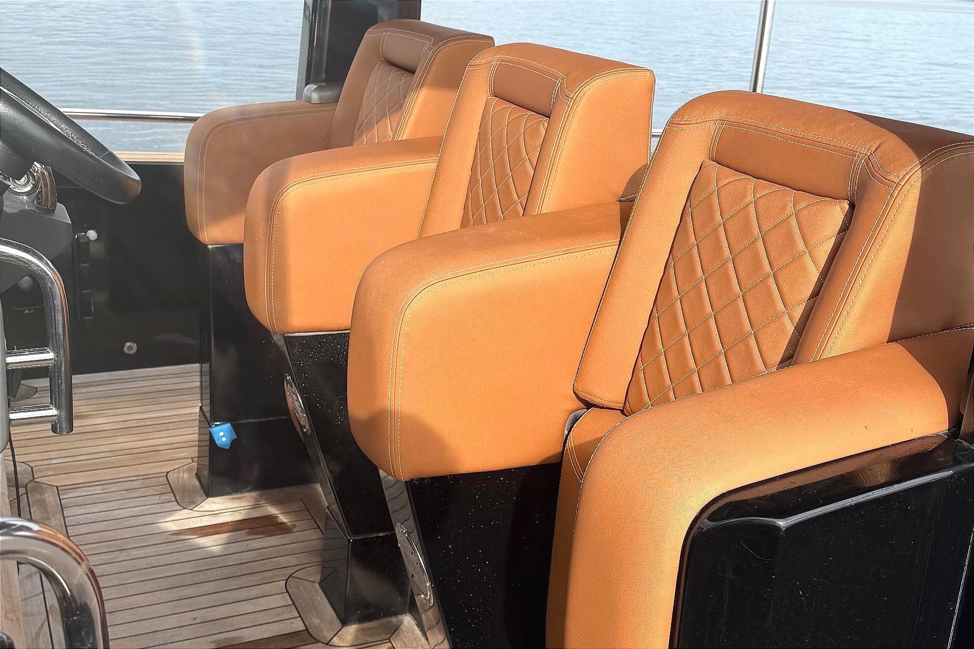 Luxurious seats in the cockpit of a 2013 Windy SR52 yacht.