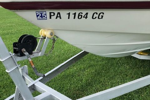 1999 Rinker 212 Fiesta Vee boat on trailer.
