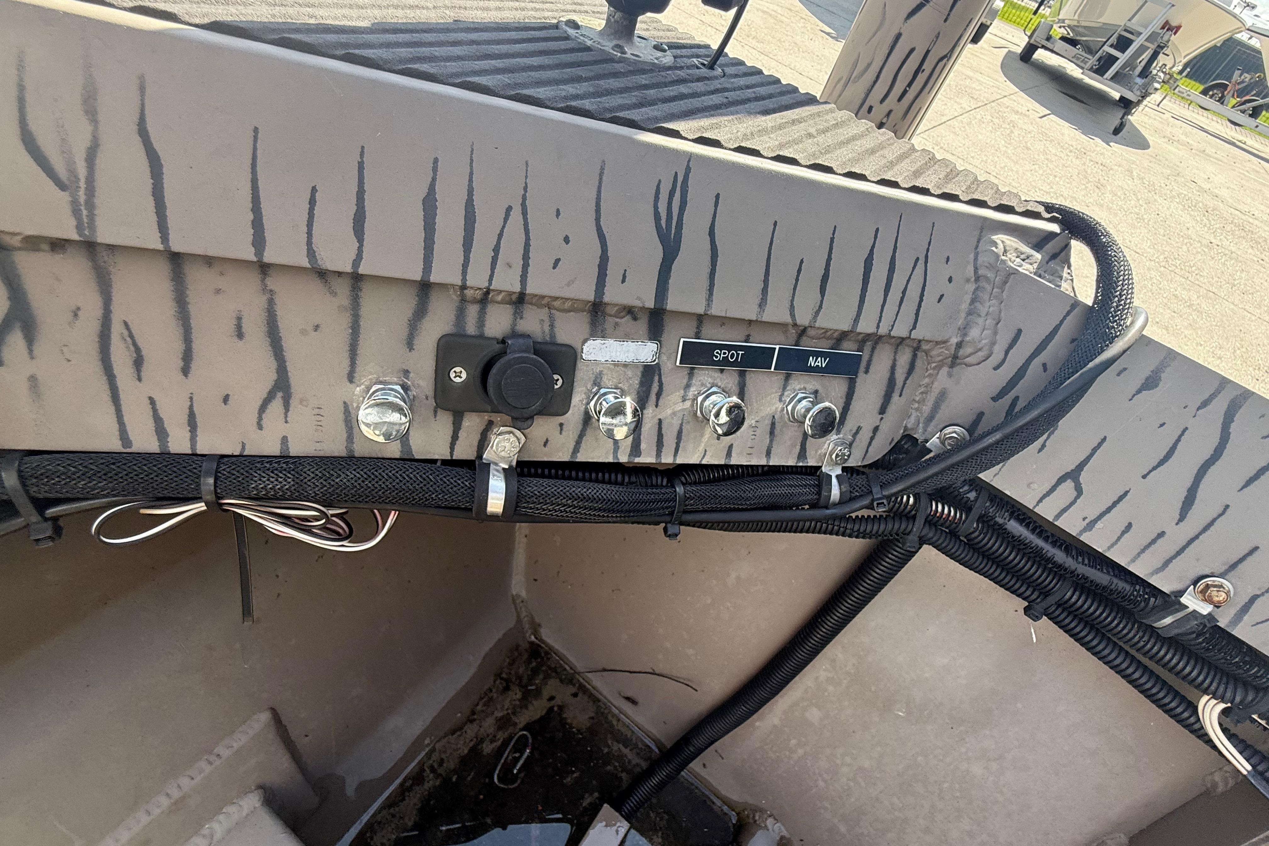 Control panel of a 2017 Pro-Drive 2048 boat with switches and wiring.