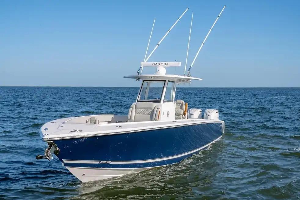 Manufacturer Provided Image: 2026 Jupiter 340LS boat on open water, featuring sleek design and advanced navigation equipment.