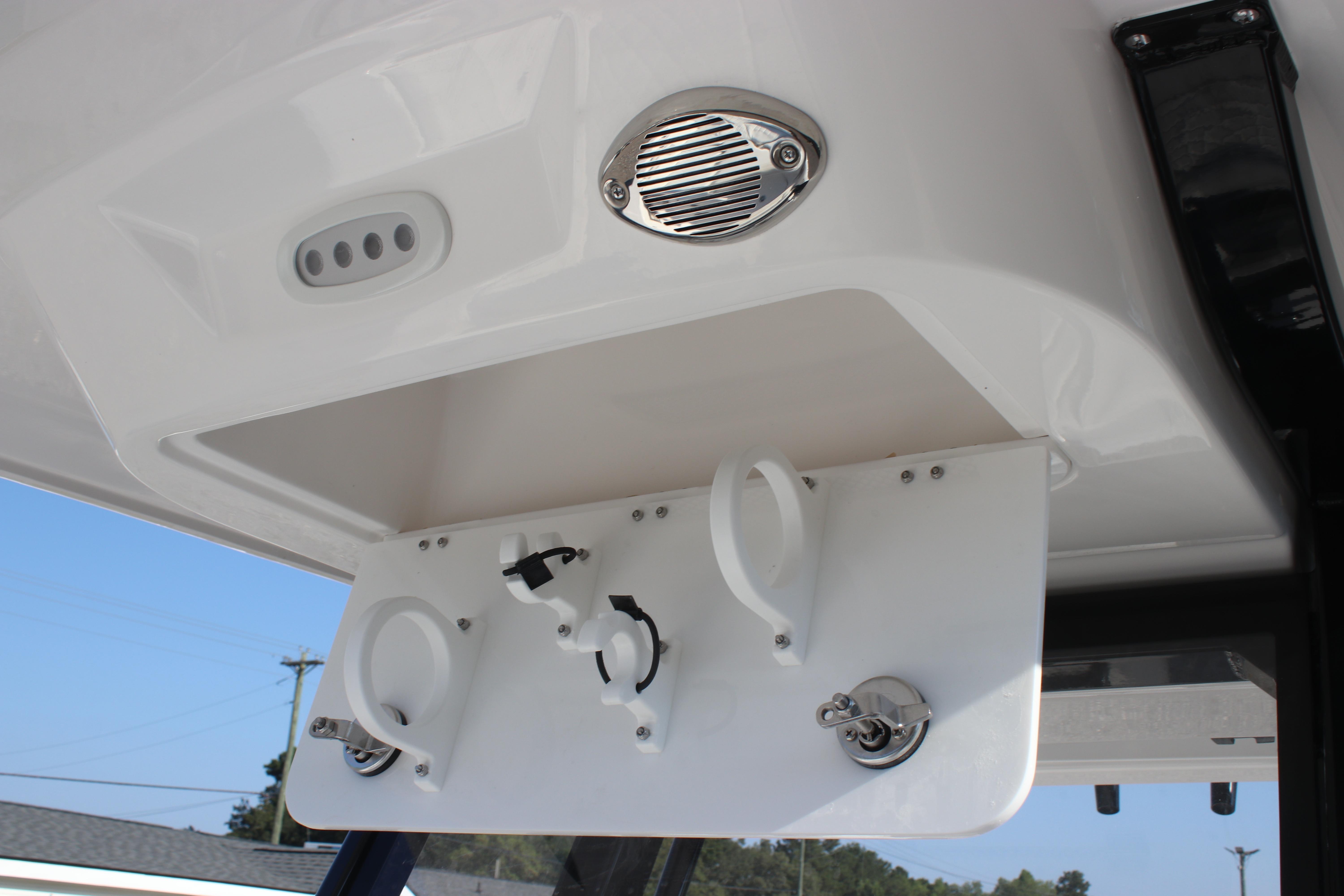 2026 Sea Fox 248 Commander boat console with speaker and rod holders.